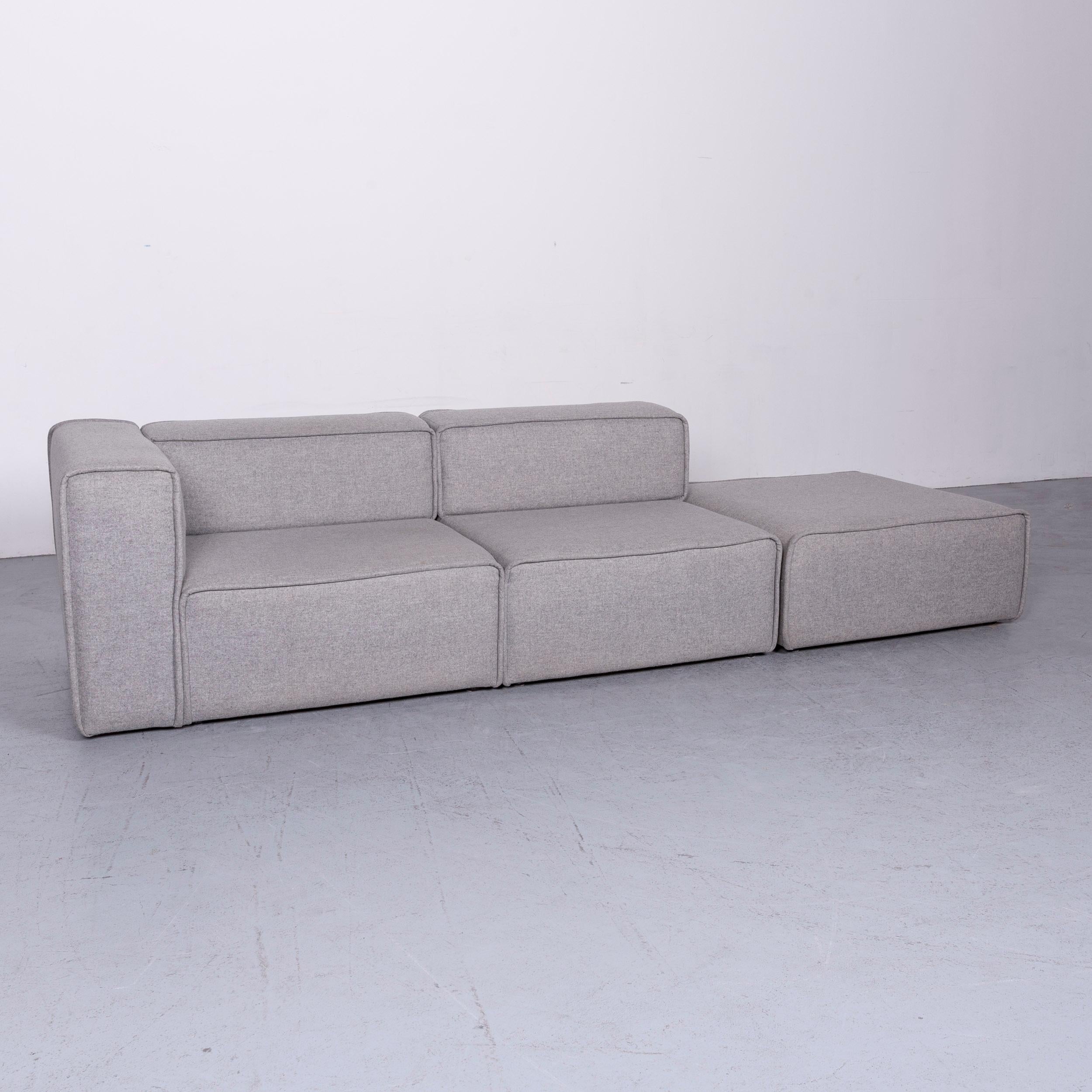 We bring to you a BoConcept carmo designer sofa grey three-seat couch.