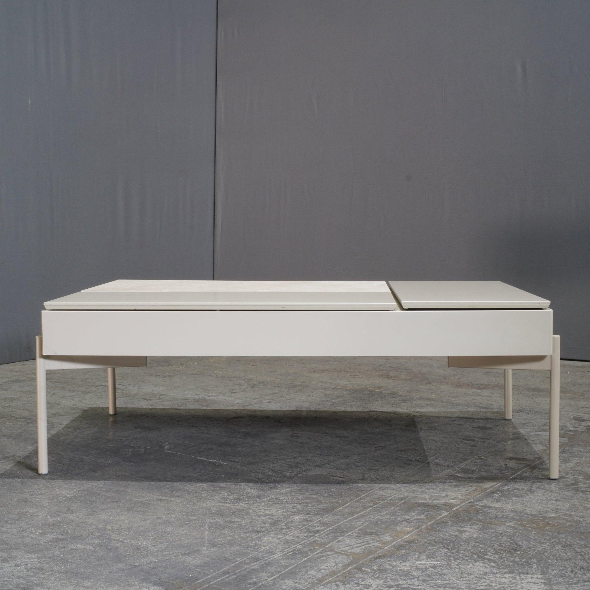The BoConcept Chiva Functional Coffee Table, designed by Morten Georgsen, is a versatile blend of modern aesthetics and practical innovation. This sleek piece features a minimalist design, characterized by clean lines and a sophisticated finish,