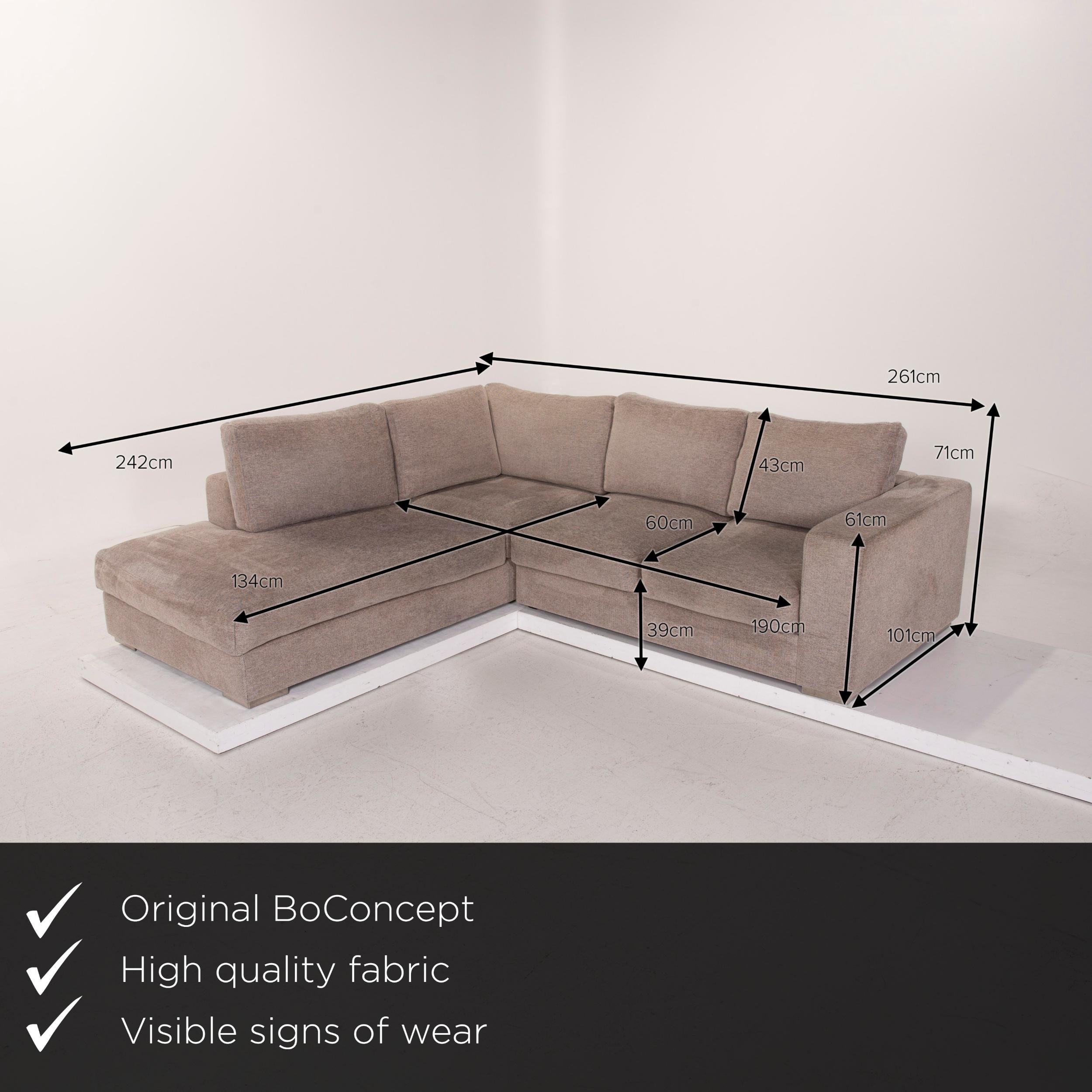 We present to you a BoConcept fabric sofa beige corner sofa.



 Product measurements in centimeters:
 

Depth 101
Width 242
Height 71
Seat height 39
Rest height 61
Seat depth 60
Seat width 134
Back height 43.
 