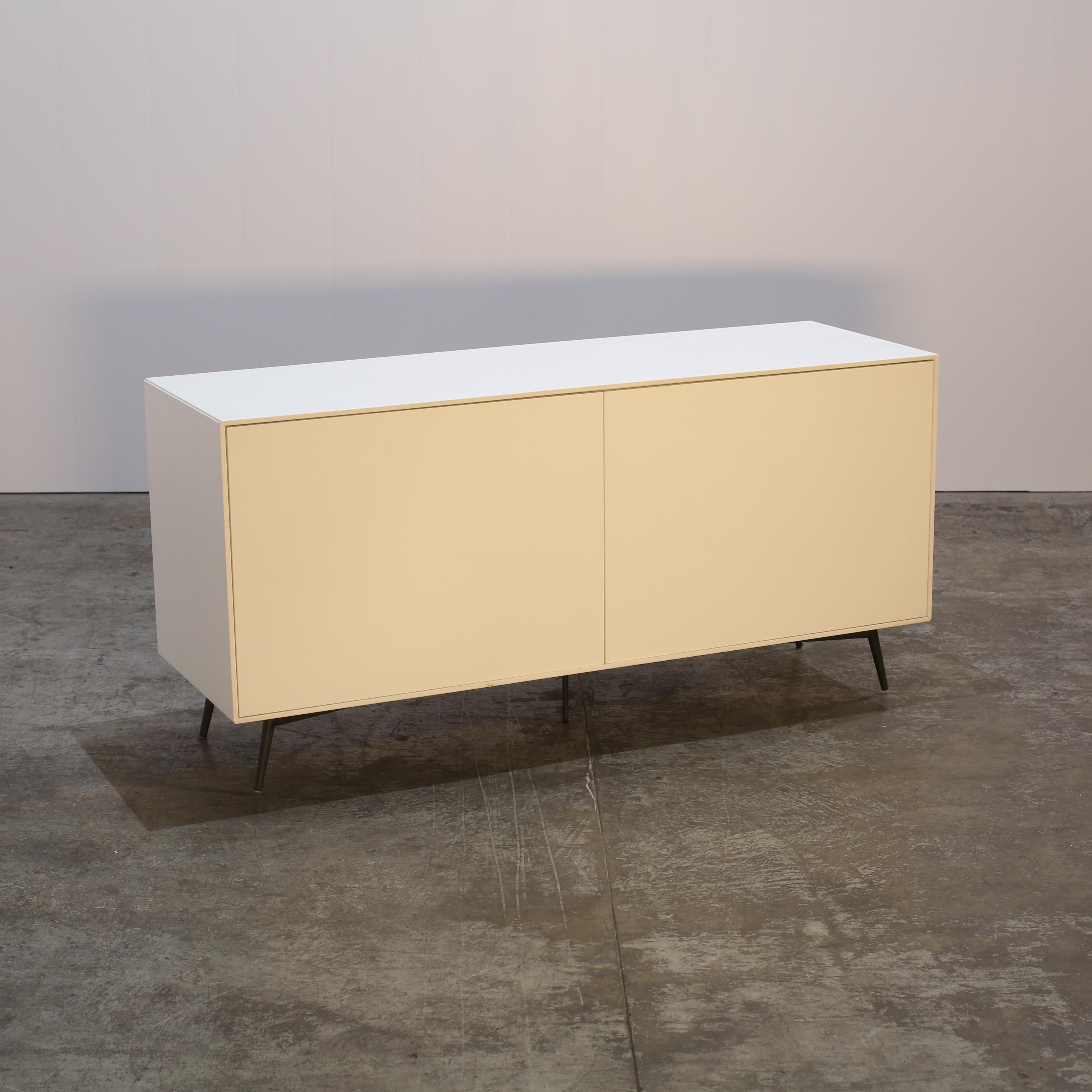Introducing the BoConcept Fermo Sideboard, designed by renowned Danish designer Morten Georgsen. This stunning piece is a perfect blend of functionality and style, making it a must-have for any modern home. Crafted with high-quality materials, the