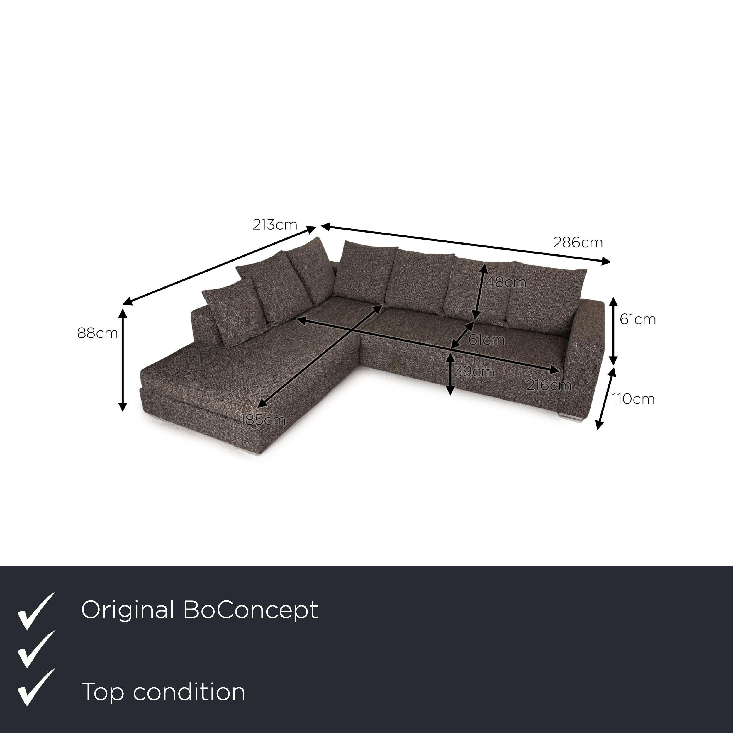 We present to you a BoConcept Genova fabric sofa gray corner sofa couch.

Product measurements in centimeters:

depth: 178
width: 213
height: 88
seat height: 39
rest height: 61
seat depth: 61
seat width: 185
back height: 48.
 
 