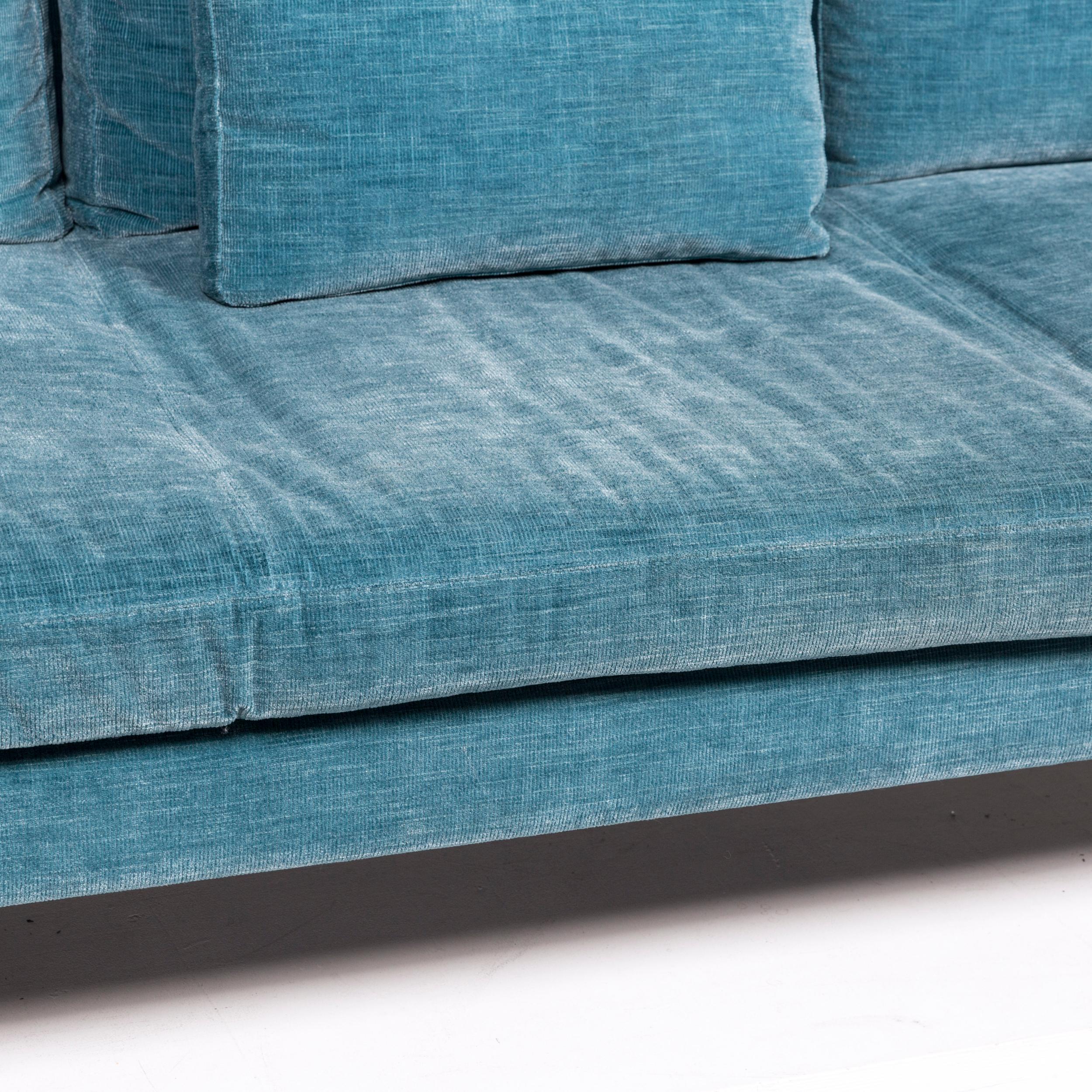 We bring to you a BoConcept Istra fabric sofa blue three-seat couch.
   
 

 Product measurements in centimeters:
 

Depth 97
Width 205
Height 83
Seat-height 41
Rest-height 64
Seat-depth 71
Seat-width 146
Back-height 40.