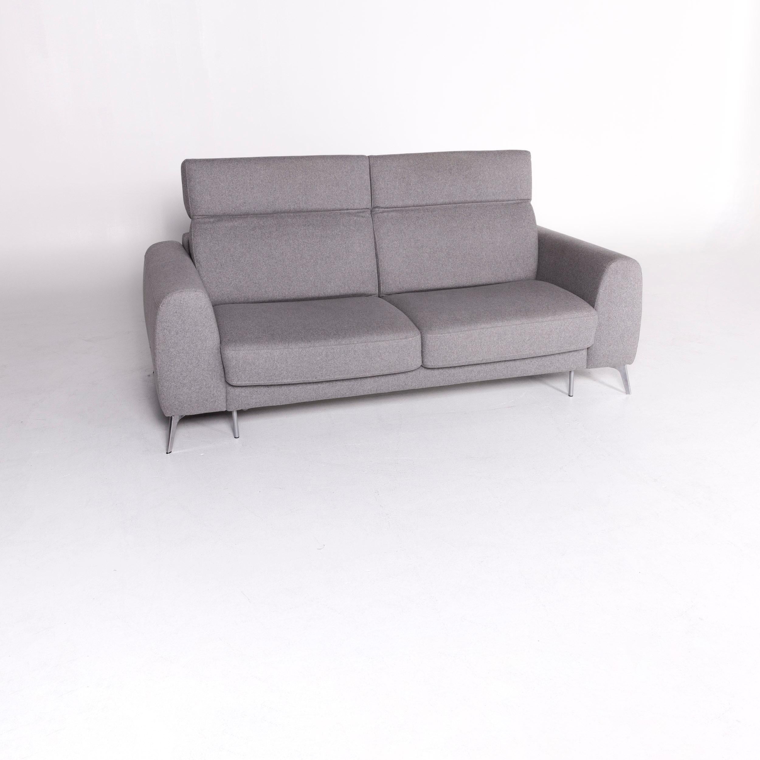 We bring to you a BoConcept Madison designer fabric gray feature sofa bed two-seat couch.

Product measurements in centimeters:

Depth 106
Width 212
Height 85
Seat-height 46
Rest-height 67
Seat-depth 58
Seat-width 160
Back-height 38.
   