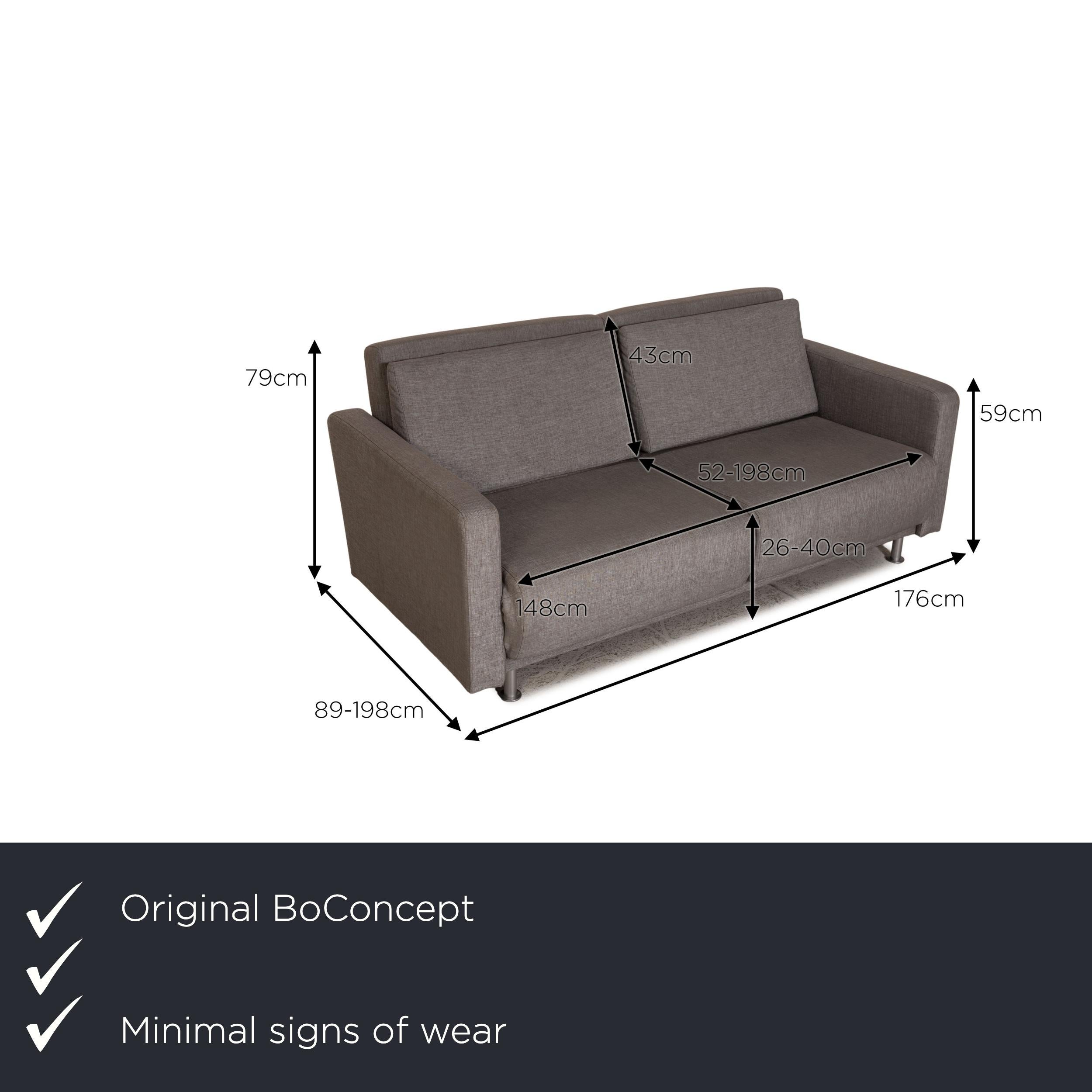 We present to you a BoConcept Melo sofa fabric gray two-seater couch function sleeping function.

Product measurements in centimeters:

Depth: 89
Width: 176
Height: 79
Seat height: 26
Rest height: 59
Seat depth: 52
Seat width: 148
Back
