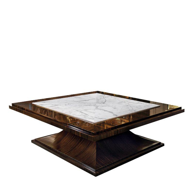 A lavish and refined design that will take center stage in classic and modern interiors of plush character, this stupendous coffee table features clean and elegant lines handcrafted using precious Bocote wood. The square top is enriched with a fine