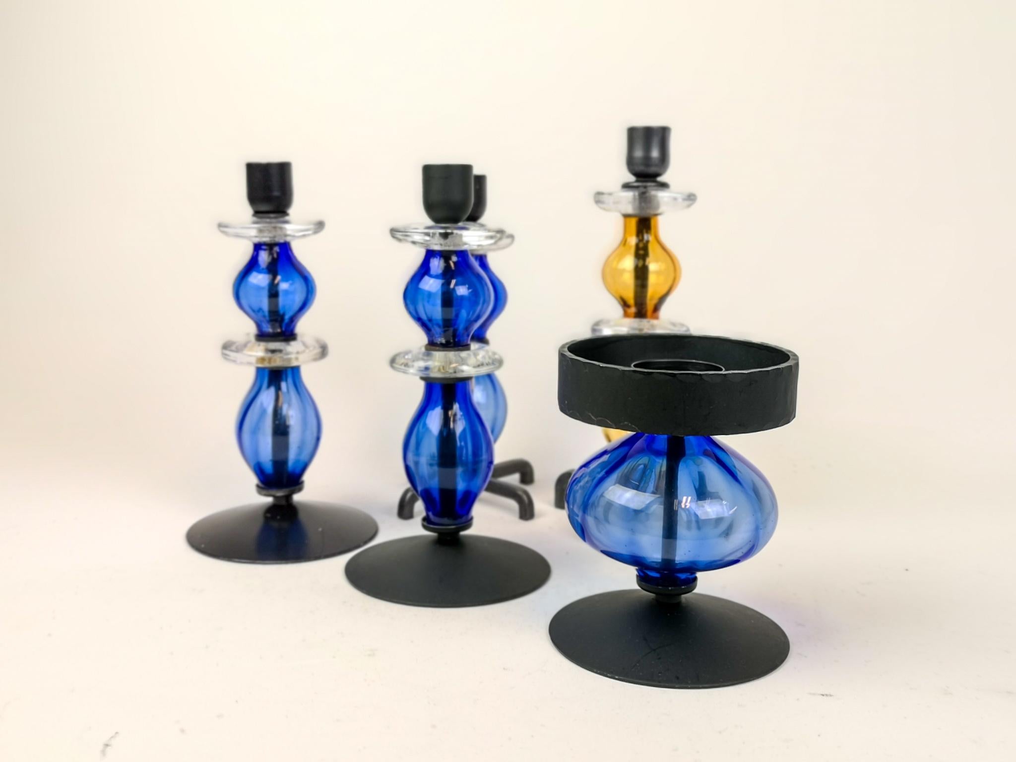 This collection containing five pieces of art glass/candle holders was manufactured at Boda and designed by Erik Höglund in Sweden during 1960-1970s.
The glass works perfect the black metal.

Good vintage condition

Measures: The larges D 10, H
