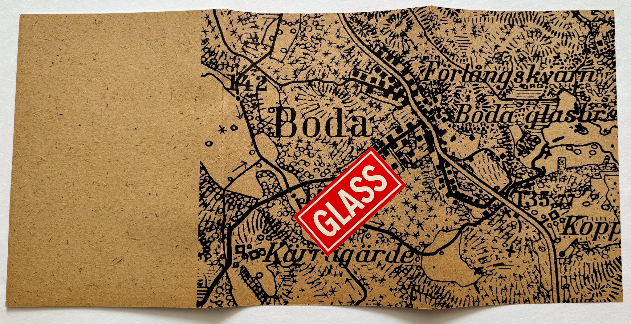 Promotional booklet advertising the Boda Glass Works and documenting the process of glass making at the Boda factory in southeastern Sweden. Published by Boda circa 1964. Showcases work by Fritz Kallenberg and Erik Hoglund. A handsome publication,