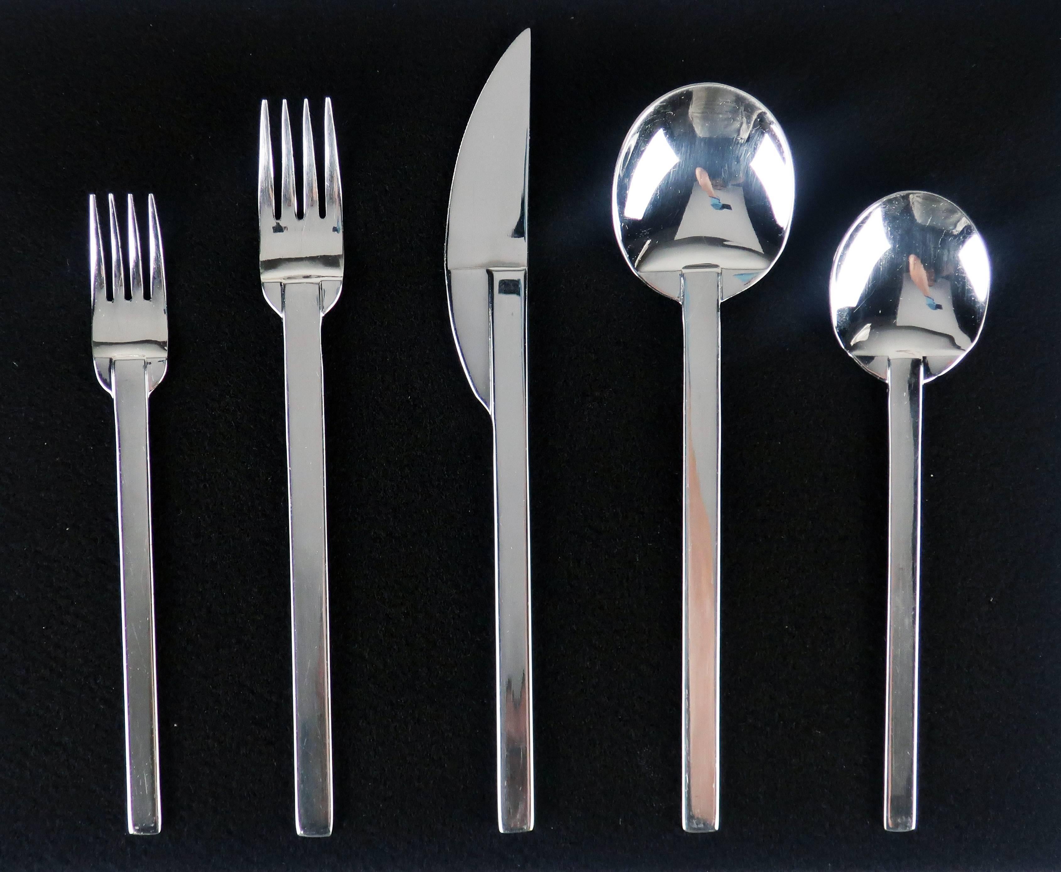 A stunning stainless flatware set from Boda Nova with a great Mid-Century Modern shape and style. The Stockholm pattern was discontinued in 1997 and is hard to find, especially in such a large complete set. This service for ten includes salad and