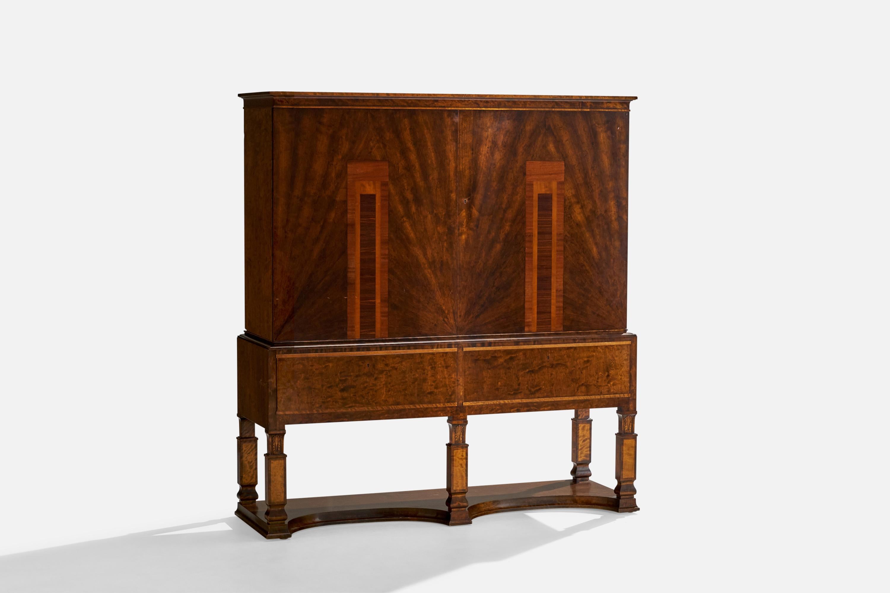 A birch cabinet with wooden inlays produced by Bodafors, Sweden, c. 1930s.
