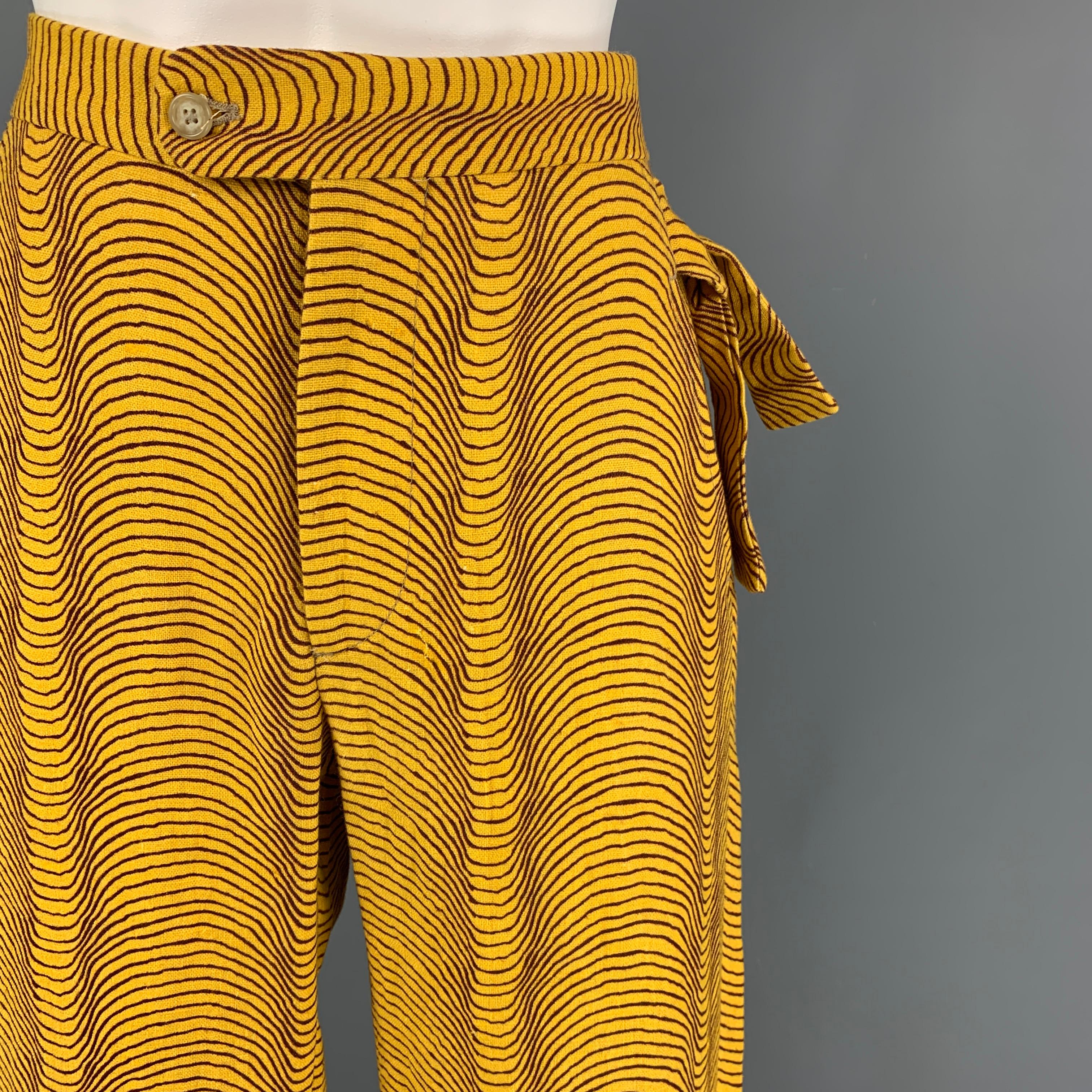 BODE pants comes in a yellow & brown 