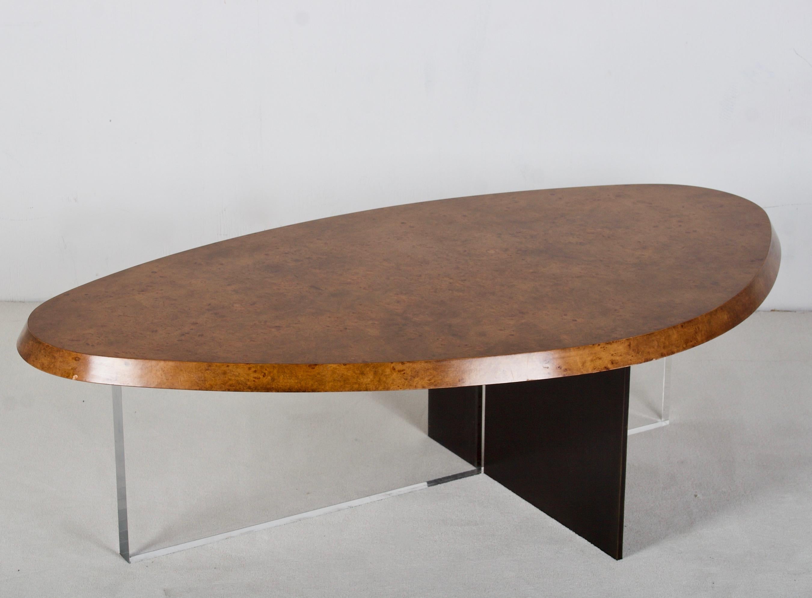 A modern burlwood, metal and acrylic coffee table by
Therien and Co. Los Angeles.
 