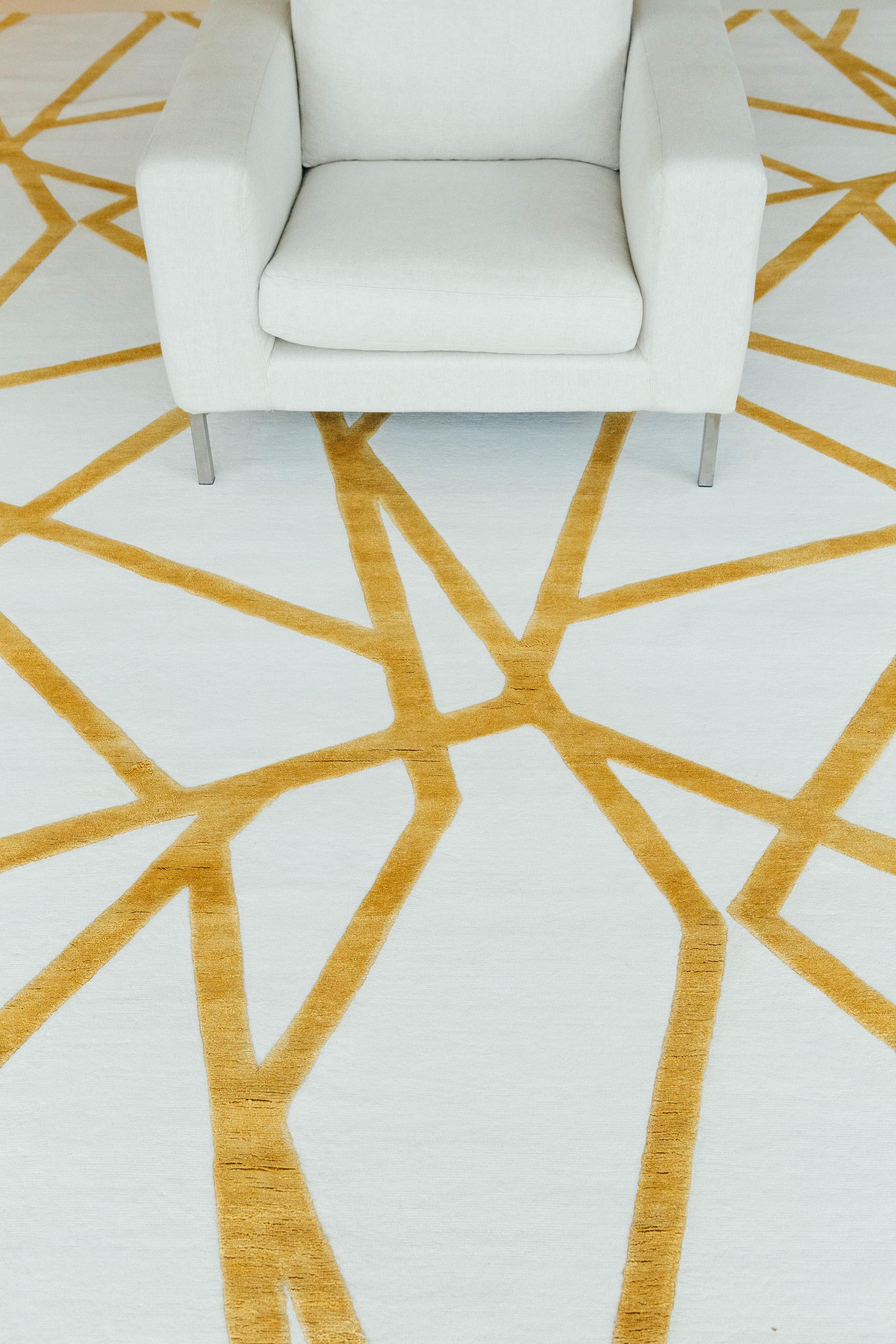 Bodhi Bar is an abstract piece that is made up of wool with embossed silk detailing. It is a part of our Design Rhymes Collection which pulls inspiration from different forms of architecture. The fine lines and sharp edges moving through the rug