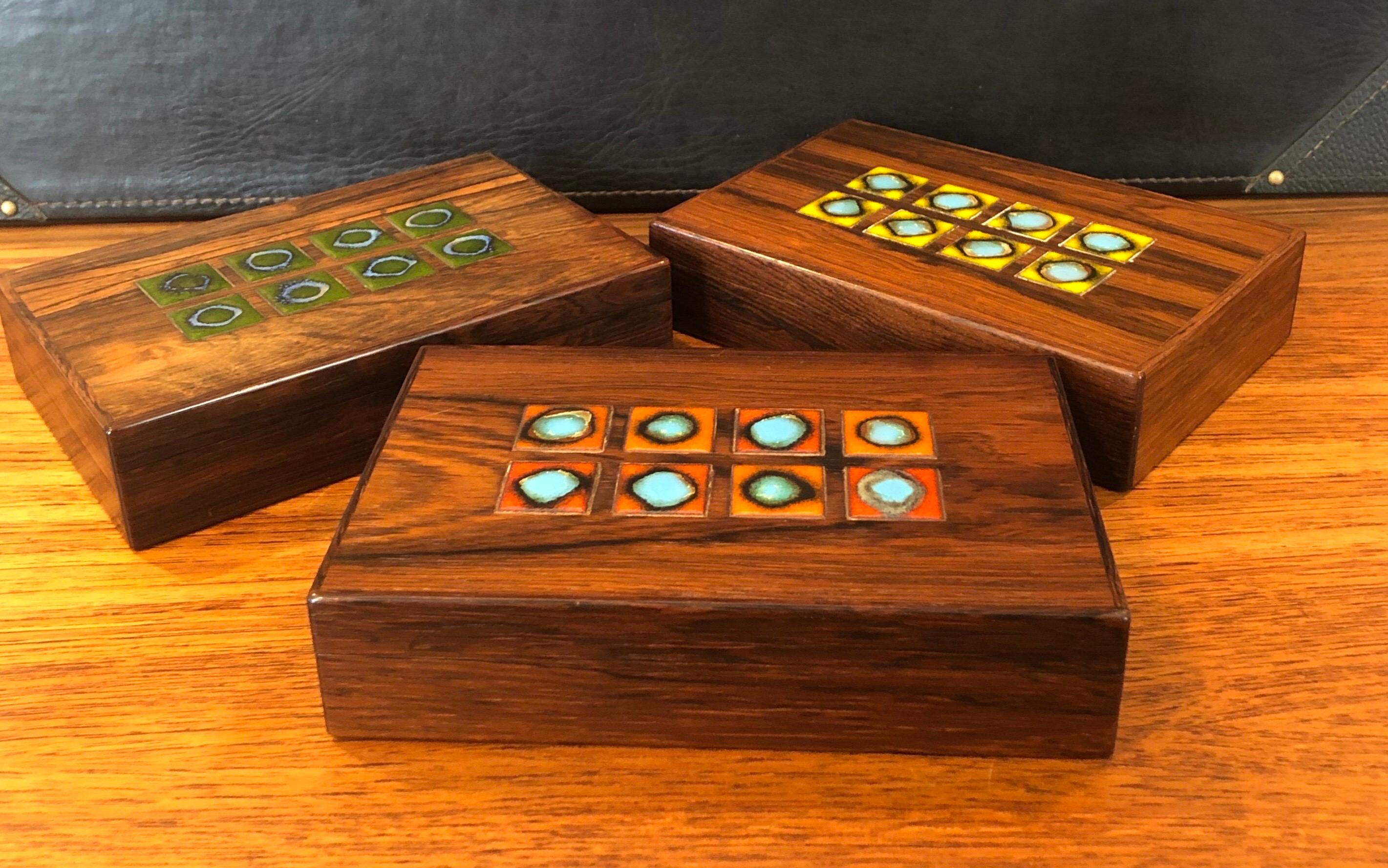 Three beautifully crafted solid wood trinket boxes / humidors by Danish craftsman Alfred Klitgaard, circa 1960s. Very detailed construction and exquisite finish with a eight gorgeous Bodil Eje (orange, yellow or green) ceramic tiles inset in the