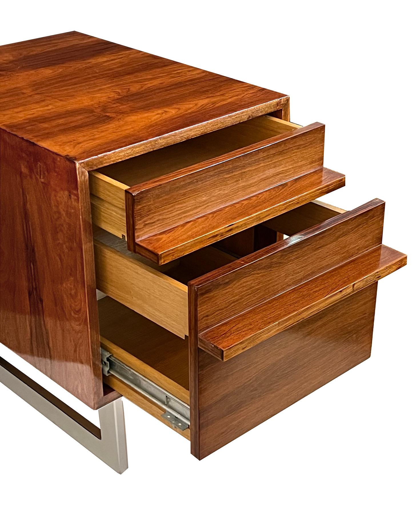 designed in 1959 by Bodil Kjær to accompany her iconic ‘James Bond’ desk in a well-figured and deeply patinated rosewood; manufacrtured by E. Pedersen & Søn for Jason Møbler; fitted with one filing drawer and one smaller drawer all supported on