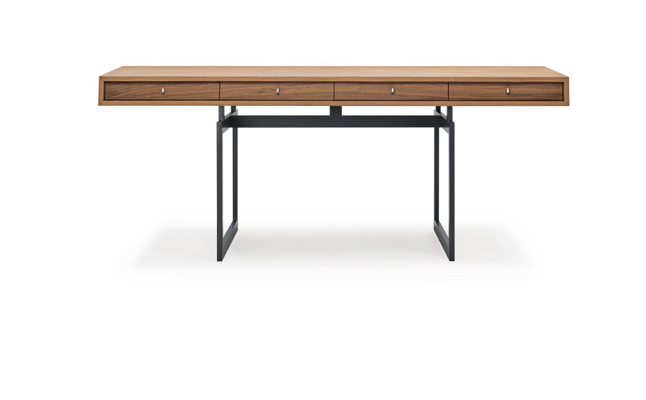 Bodil Kjaer, 1959 Dark Grey And Walnut Office Desk For Karakter

Coveted by renowned modernist architects Marcel Breuer, José Luis Sert and Paul Rudolph, Danish architect Bodil Kjær's Office Desk from 1959 has been dubbed 'the most beautiful desk in
