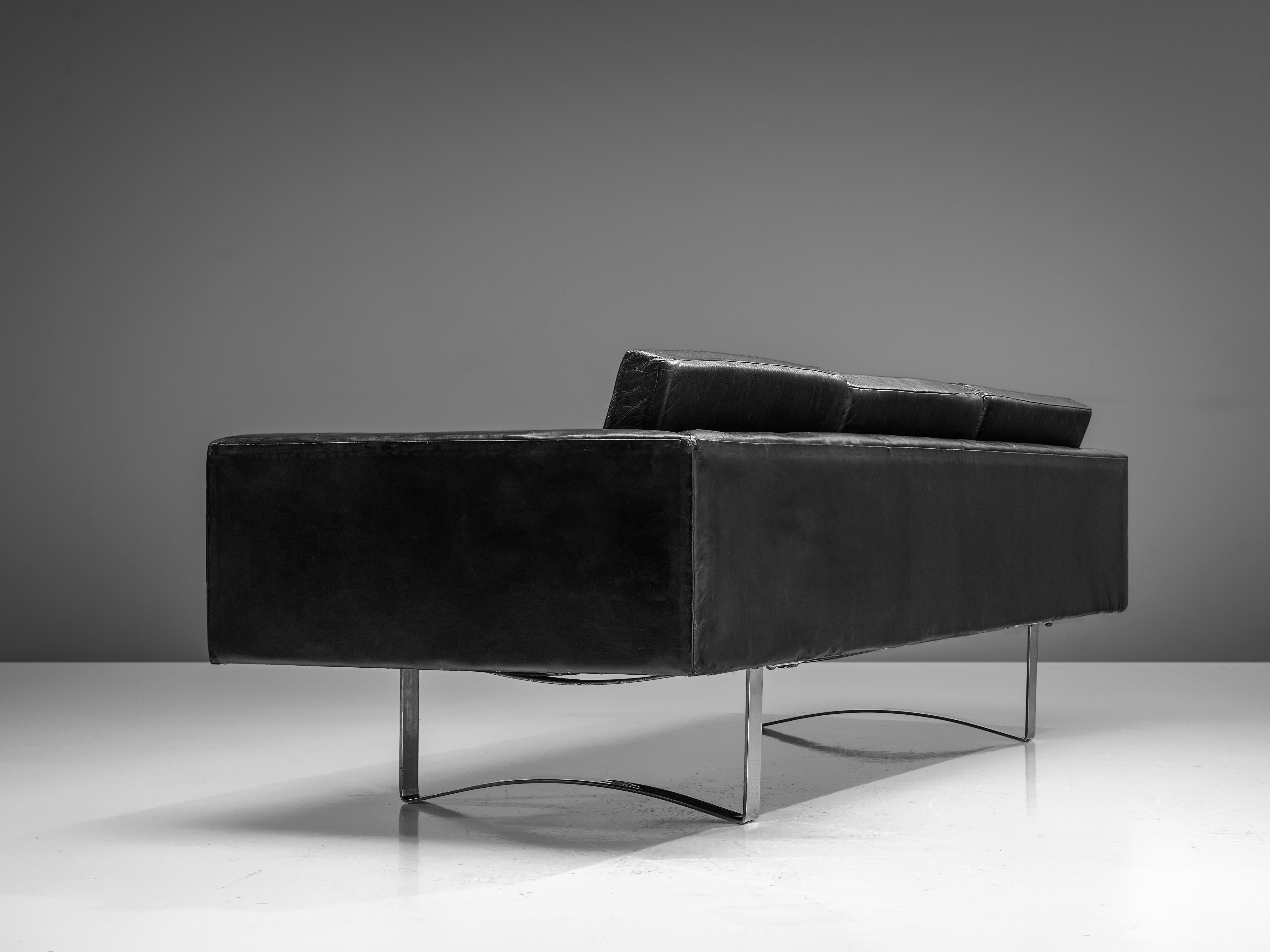 Bodil Kjaer for Hovedstadens Møbelfabrik, sofa model 71, leather, steel, Denmark, 1959.

A signature piece of Bodil Kjaer, designed in 1959. Kjaer conceived this sofa together with a lounge chair for use in public spaces of contemporary