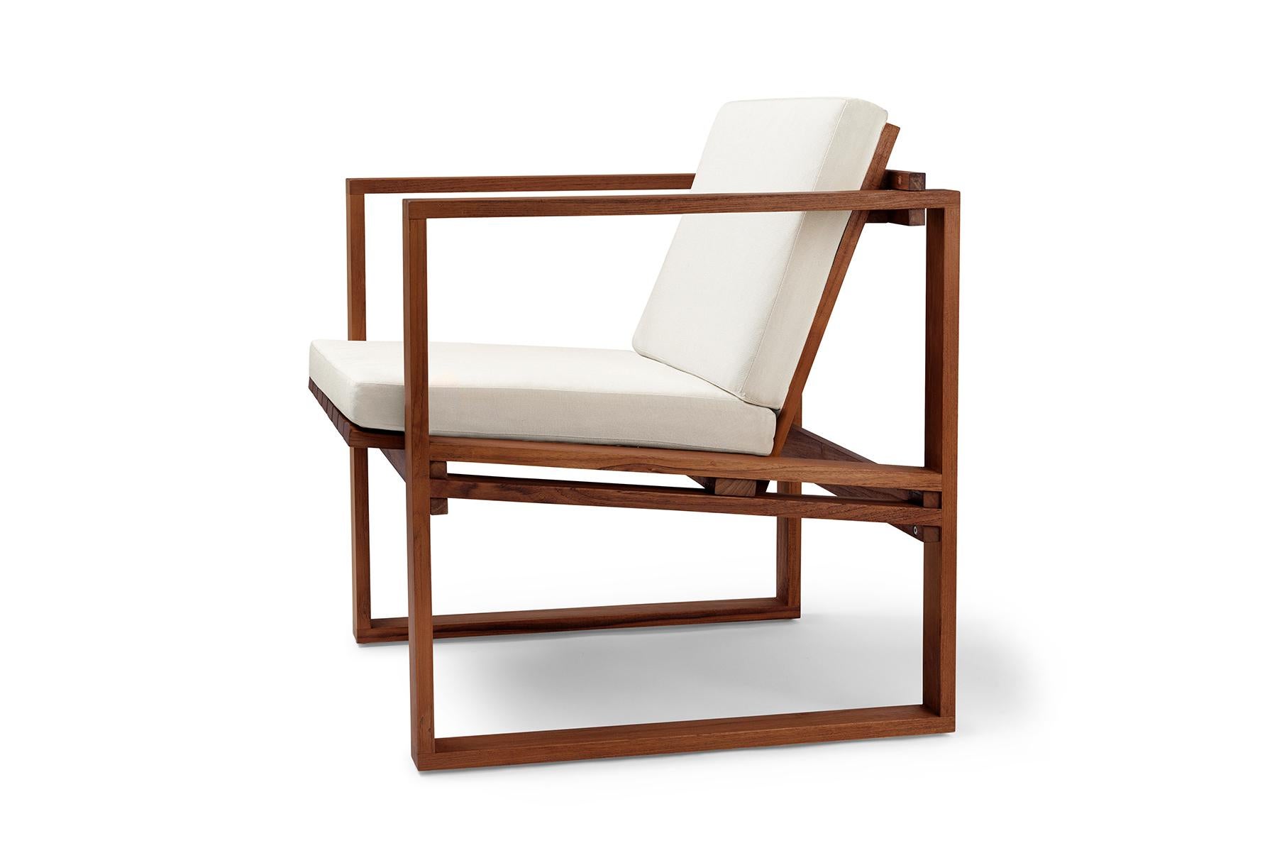 The BK11 lounge chair was designed in 1959 by Danish architect Bodil Kjær as part of her architecturally inspired Indoor-Outdoor Series. With a linear form influenced by Cubism, the chair’s solid teak construction is designed to patinate beautifully