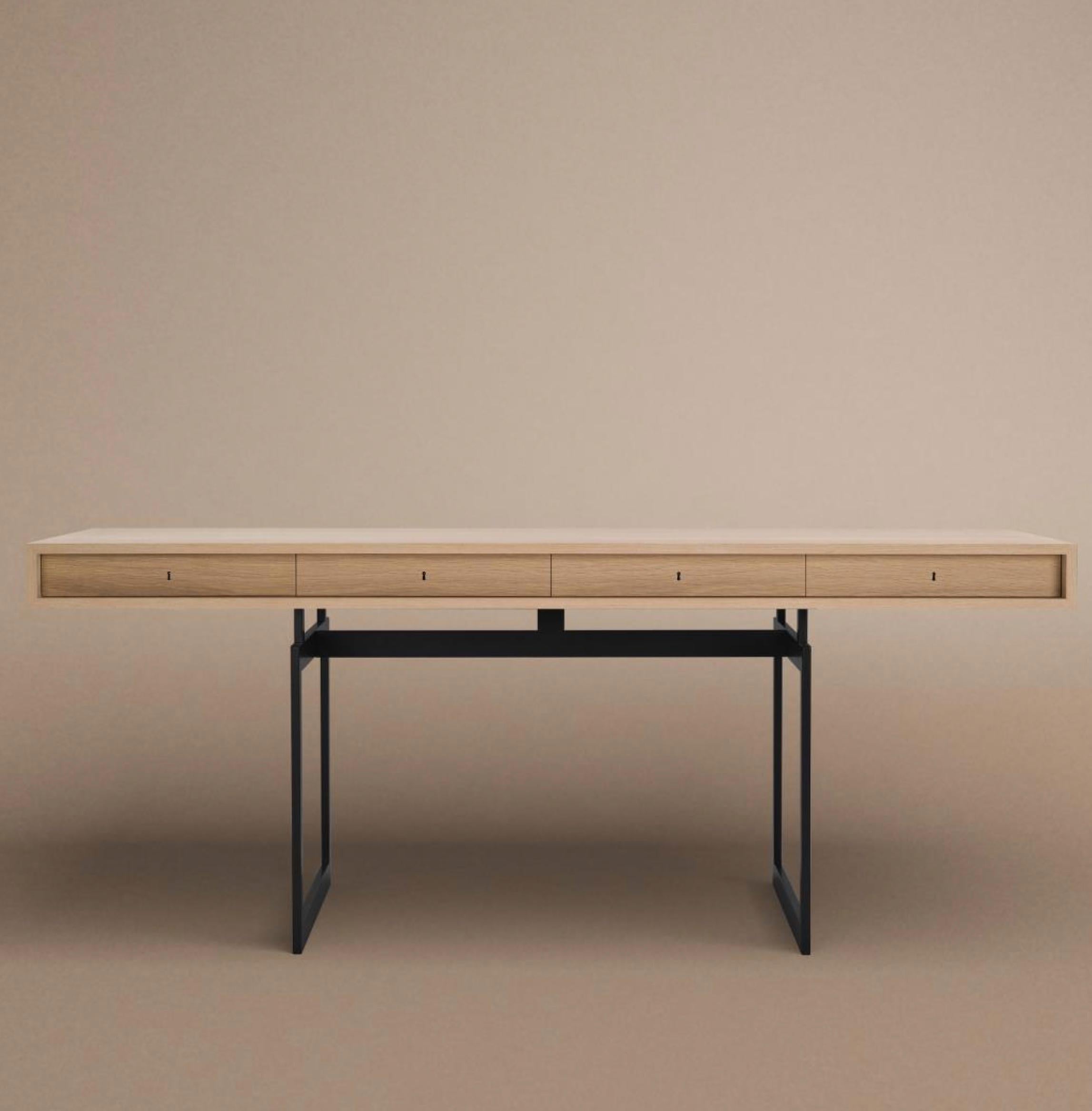 The iconic desk, designed in 1959, was the first of its kind with its pure and simplistic design, almost floating mid-air. Bodil Kjærs’ design has been called ‘The most beautiful desk in the world’ – or, the ‘James Bond desk’ as it was featured