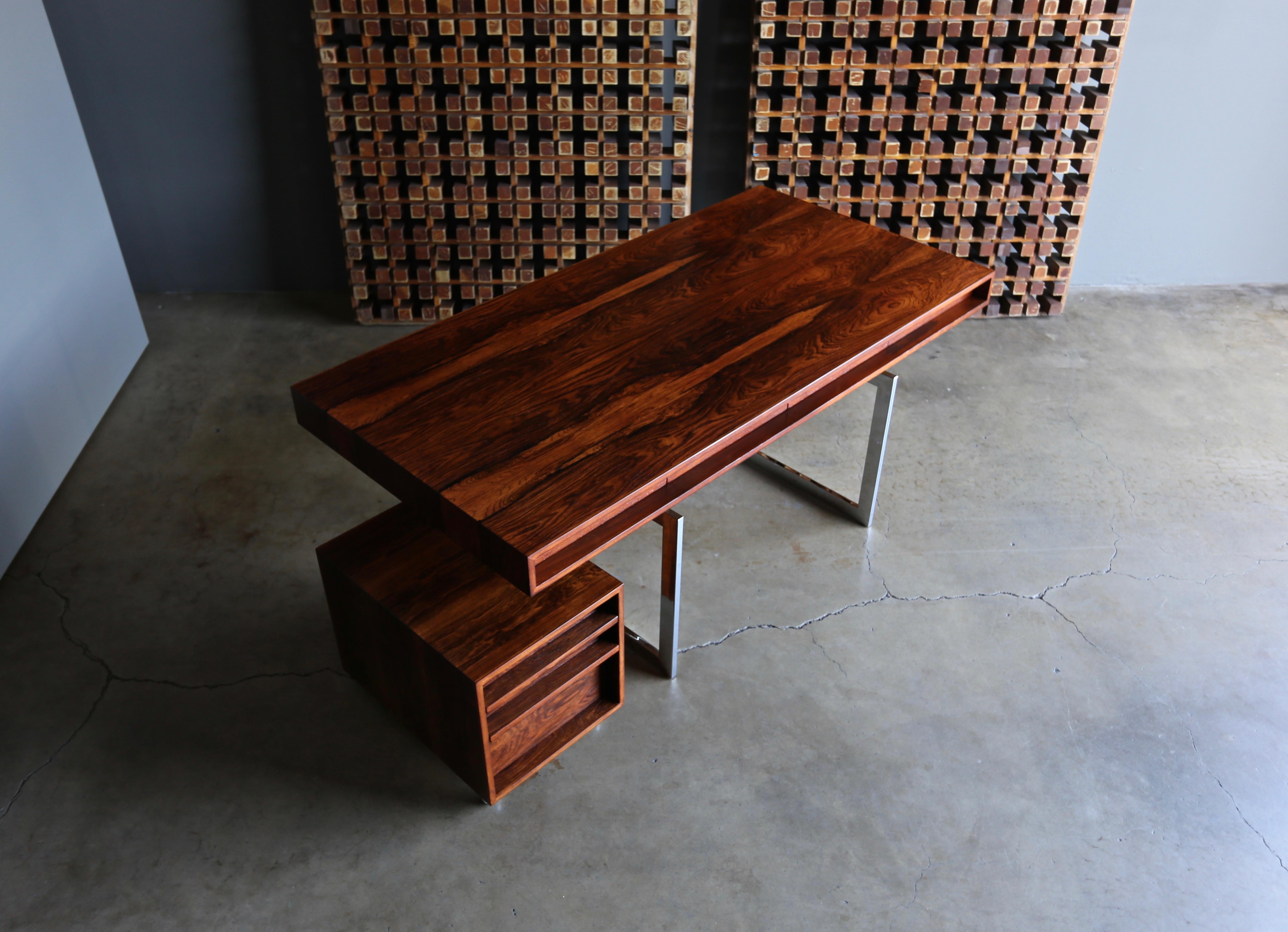 Bodil Kjaer rosewood desk for E. Pederson and Sons A/S, circa 1959. This desk retains its original key. The rolling chest of drawers pictured is included. This piece has been professionally restored. 

The desk measures: 72 7/16