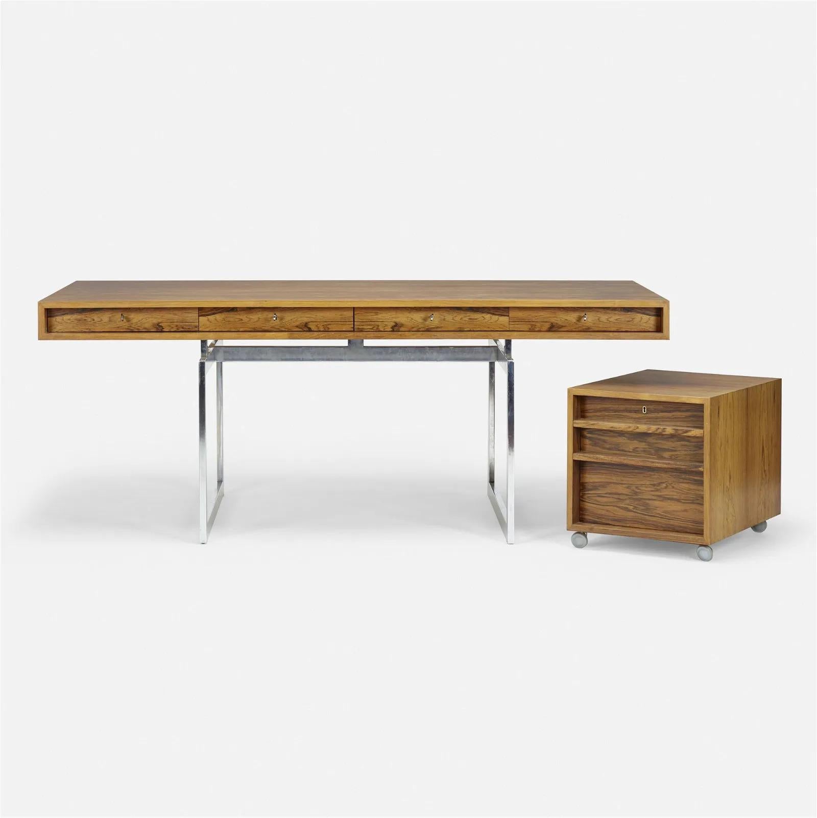 Bodil Kjaer rosewood desk with cabinet for E. Pedersen & Son and Jason Mobler Denmark. The desk features four drawers with keys. Cabinet features three drawers. Stamped manufacturer's mark to underside 'Jason Danmark Made in Denmark'. Desk is