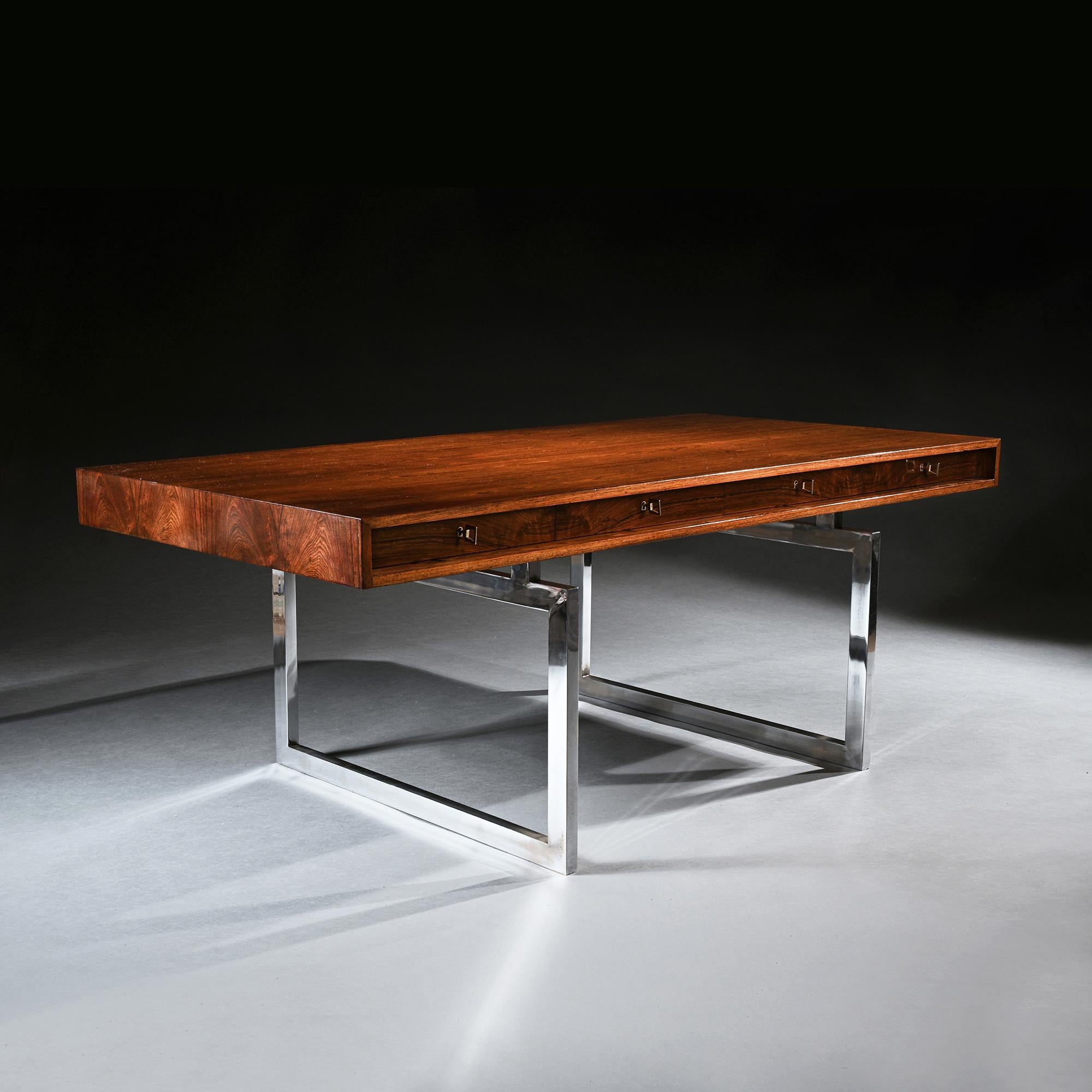 A rare Bodil Kjaer Rio rosewood four drawer writing desk model 901 for E. Pedersen & Son Denmark on chrome steel base.

Denmark circa 1959.

It doesn’t get much more iconic than this….of Scandinavian origin designed by the renowned Danish