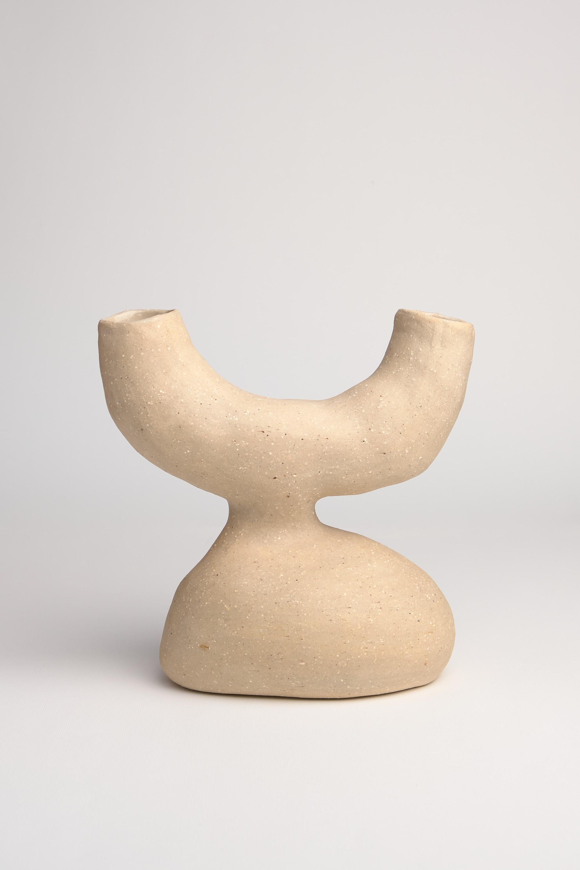 Bodily split stoneware vase by Camila Apaez
One of a kind
Materials: Stoneware
Dimensions: 22 x 12 x 21 cm

Ila Ceramica emerged from a process of inner inquiry where ceramics became a space for presence, silence, touch and patience. Camila