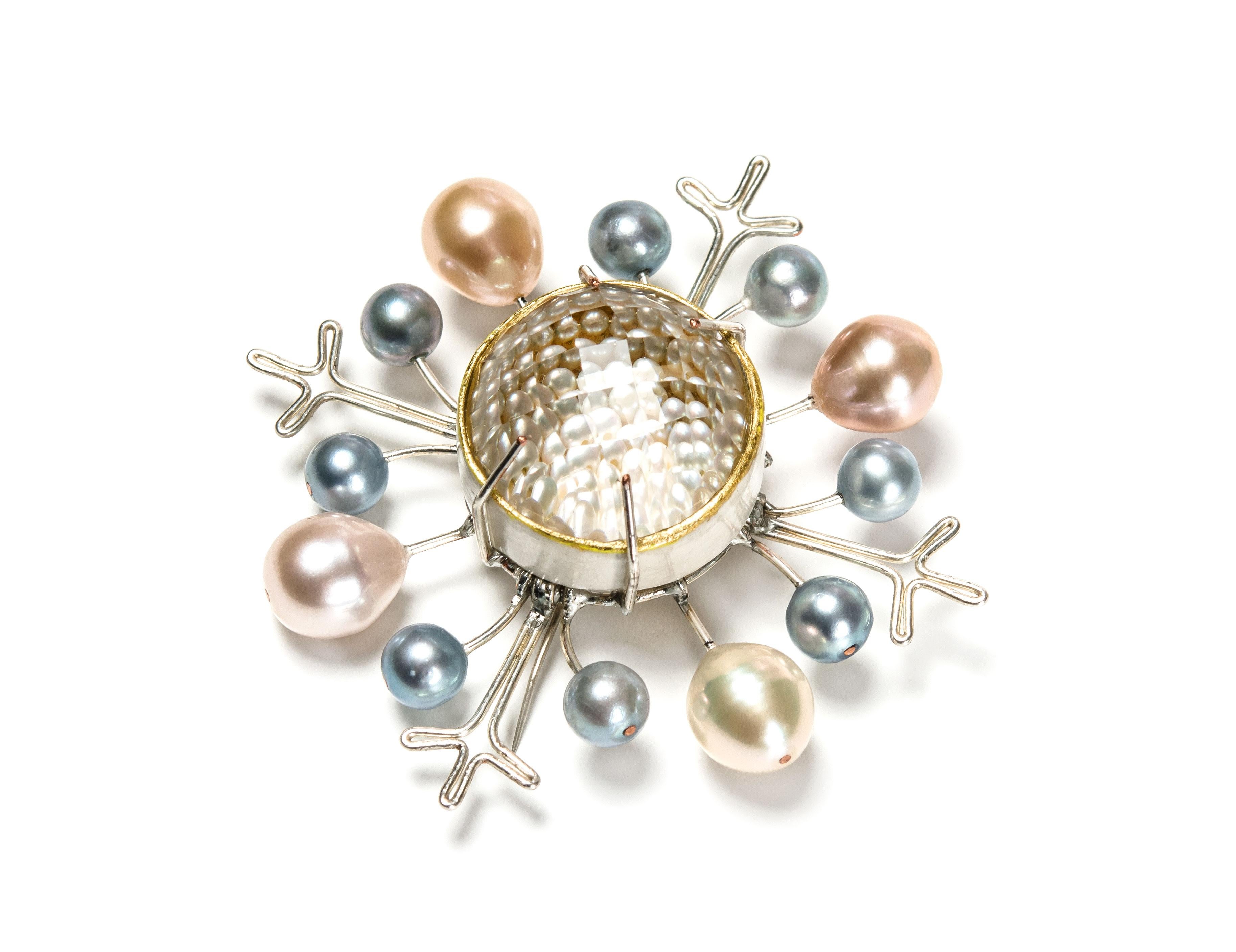 Brooch “Neve”, 2018, is a one-of-a-kind contemporary author jewelry by italian artist Gian Luca Bartellone.
Materials: papier-mâché, silver, silver-plated copper, rock crystal, pearls, gold leaf 22kt.

Great appearance with the lightweight brooch.