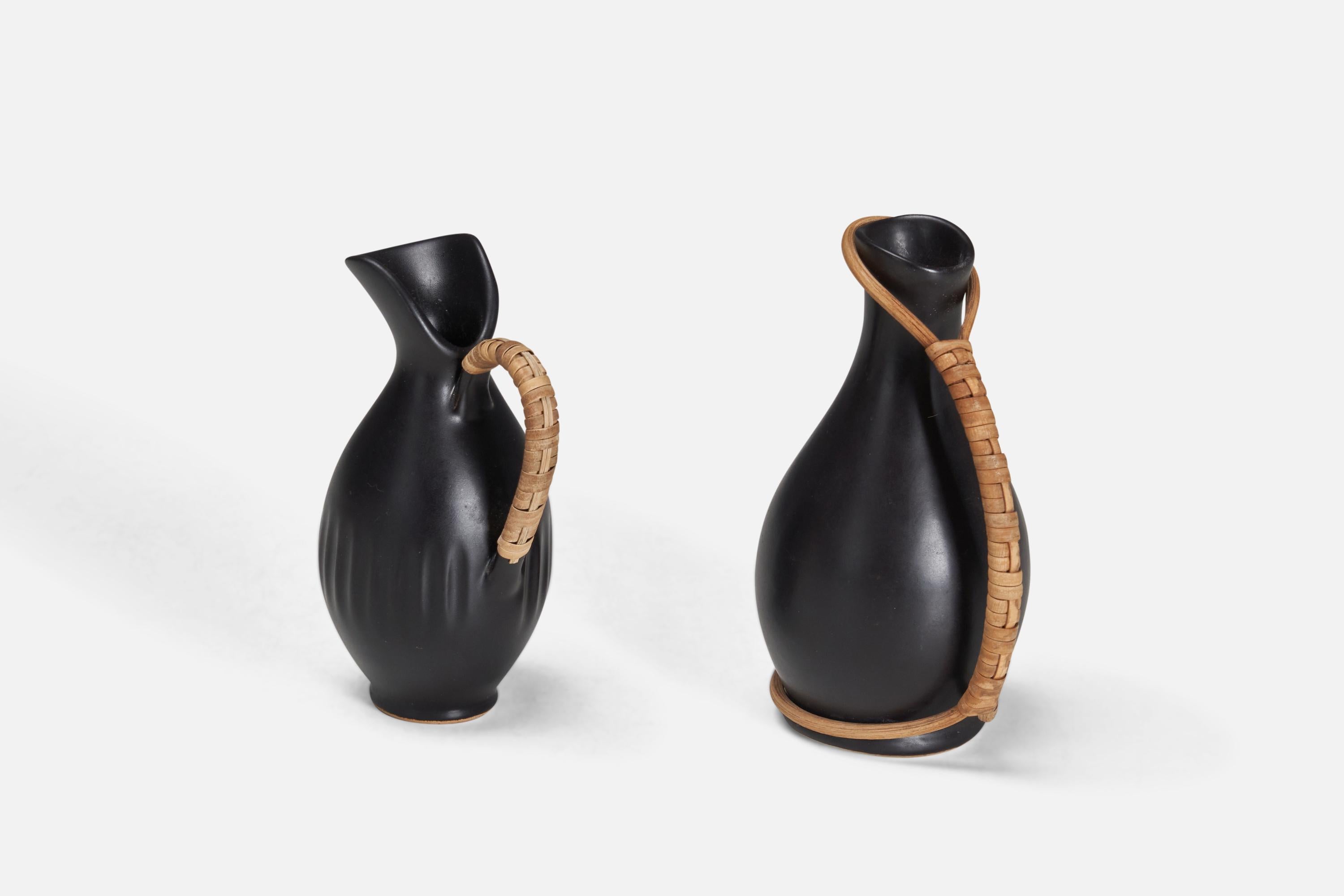 Bofa Keramik, Miniature Pitchers, Bornholm, Denmark, 1960s. One with paper label, other dated 1960.

Stated dimensions of taller example.

Other designers of the period include Ettore Sottsass, Carl Harry Stålhane, Lisa Larsson, Axel Salto, and