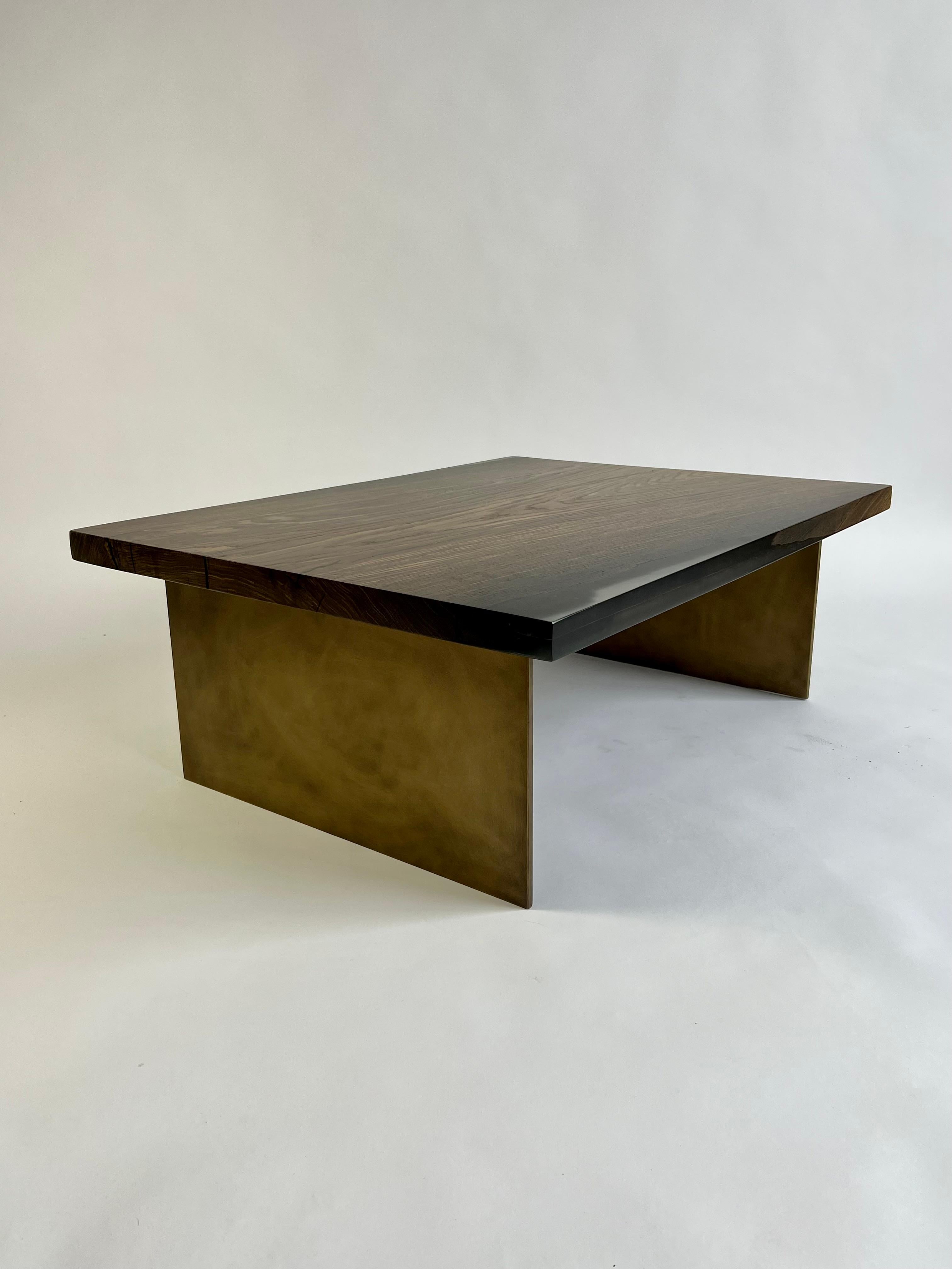 This coffee table is truly one-of-a-kind, made from ancient Bog Oak and strong epoxy resin. The wood itself is an impressive 7,000 years old and comes from Romania. It spent all those years buried underground, which kept it well-preserved by