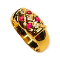 Bogo 18K Yellow Cabochon Ruby and Diamond Ring