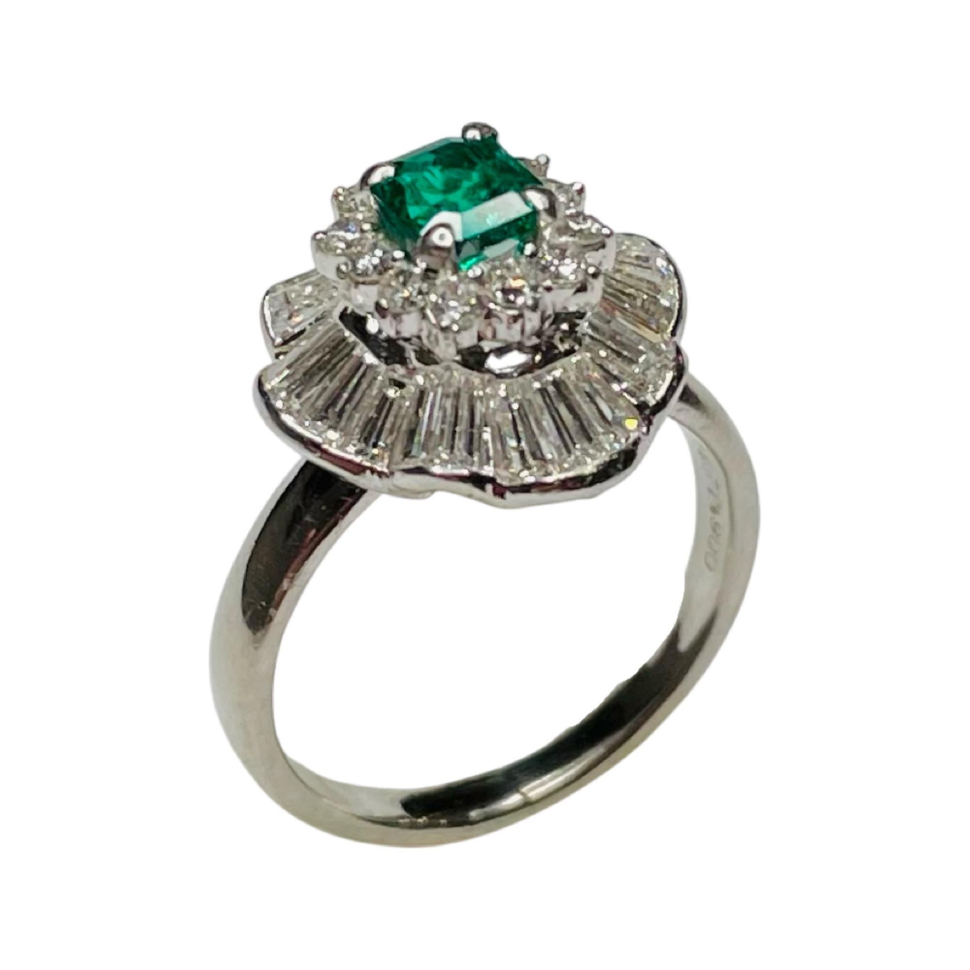 Contemporary Bogo Platinum, Diamond and Emerald Ring For Sale