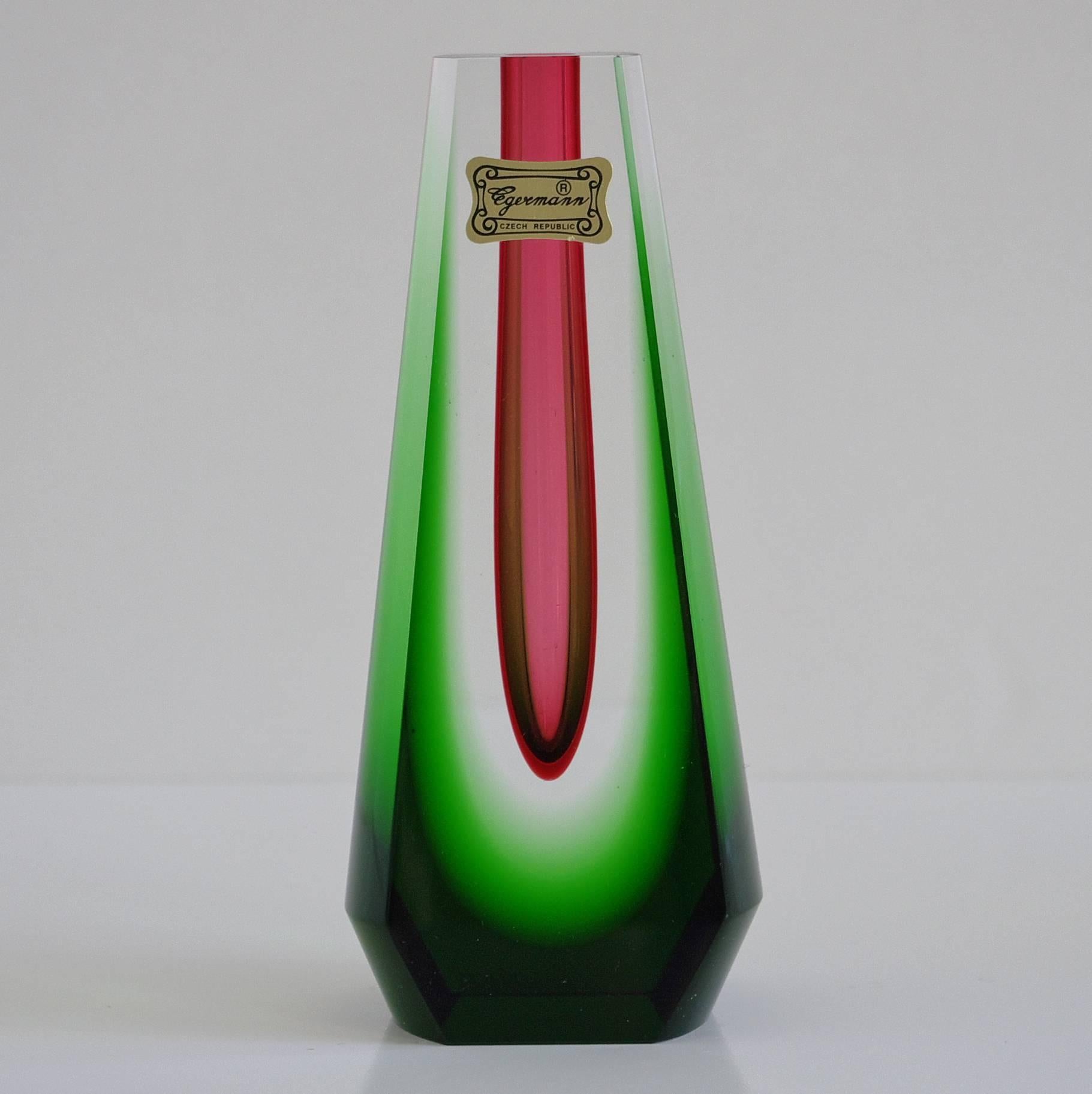 Green and amethyst faceted bohemia crystal vase by Friedrich Egermann
Made in the Czech Republic in the 1990s, with original sticker
Height: 6 inches / Width: 2.5 inches / Depth: 1.5 inches
1 in stock in Palm Springs currently ON FINAL CLEARANCE