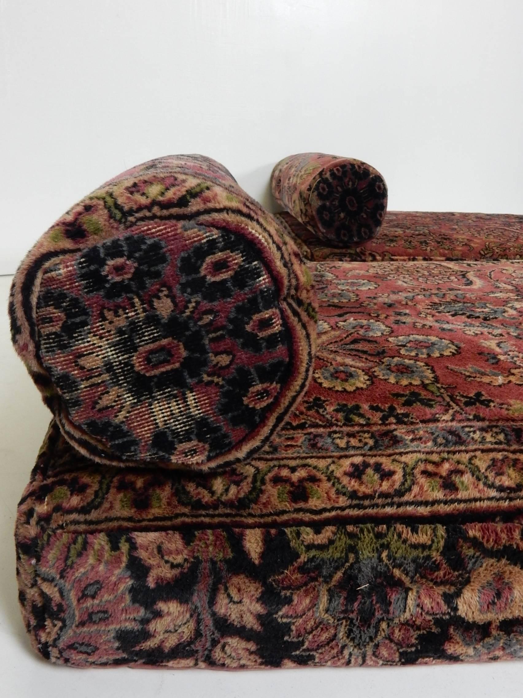 Antique Persian rug upholstered cushions with matching bolsters.
Fine quality wool rug with gorgeous colors and detail adroitly split and sewn to match perfectly together.
Bolsters also line up in a continuation of the pattern.
They each measure