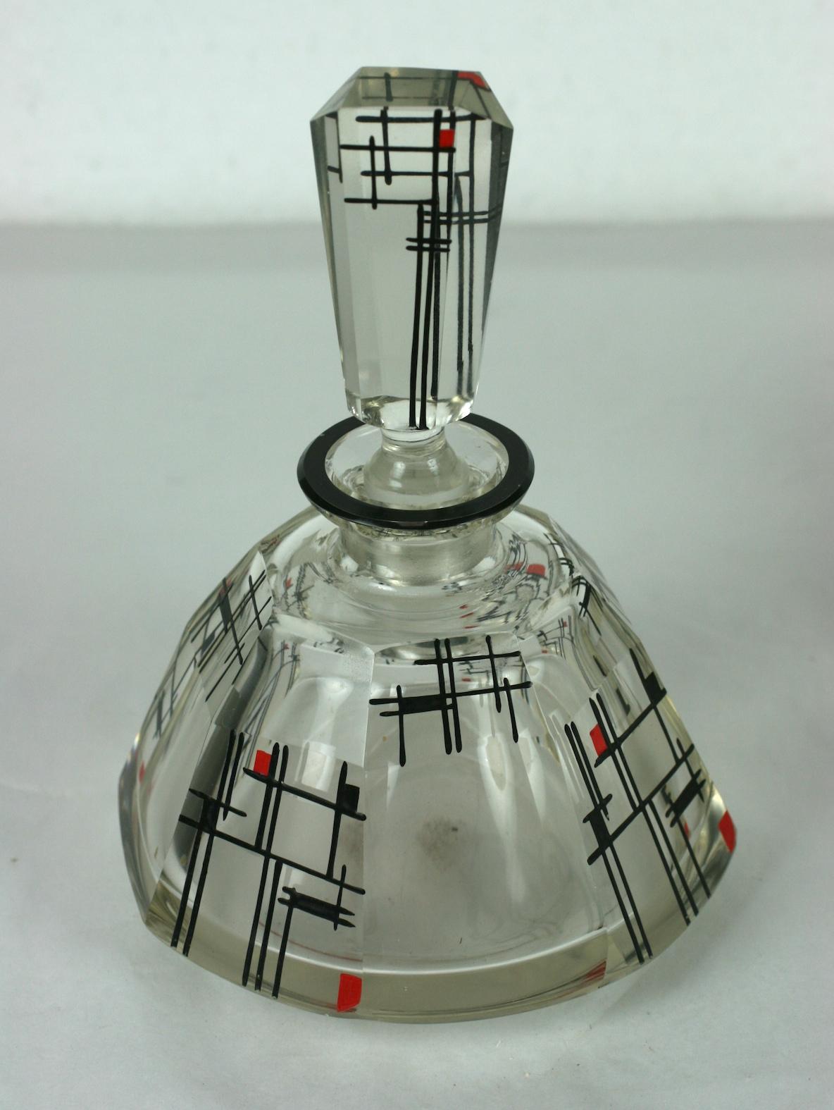 Karl Palda Art Deco crystal vanity suite, circa 1925. Both decorated with acid etched frosted squares with red and black Modrianesque motifs.  Consisting of two faceted bottles, one a perfume with tall stopper, the other an atomizer with chrome