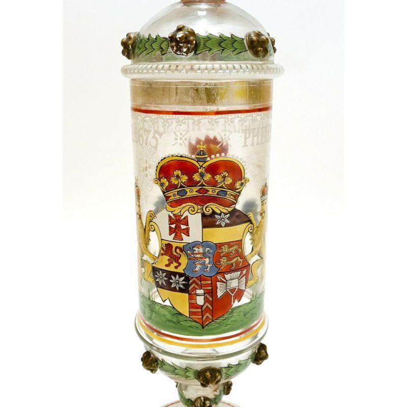 Bohemian Art Glass Lion Armorial Crest Pokal Cup, 19th Century or Earlier

Bohemian art glass lion armorial crest lidded cup, 19th Century or earlier. Inscribed 
