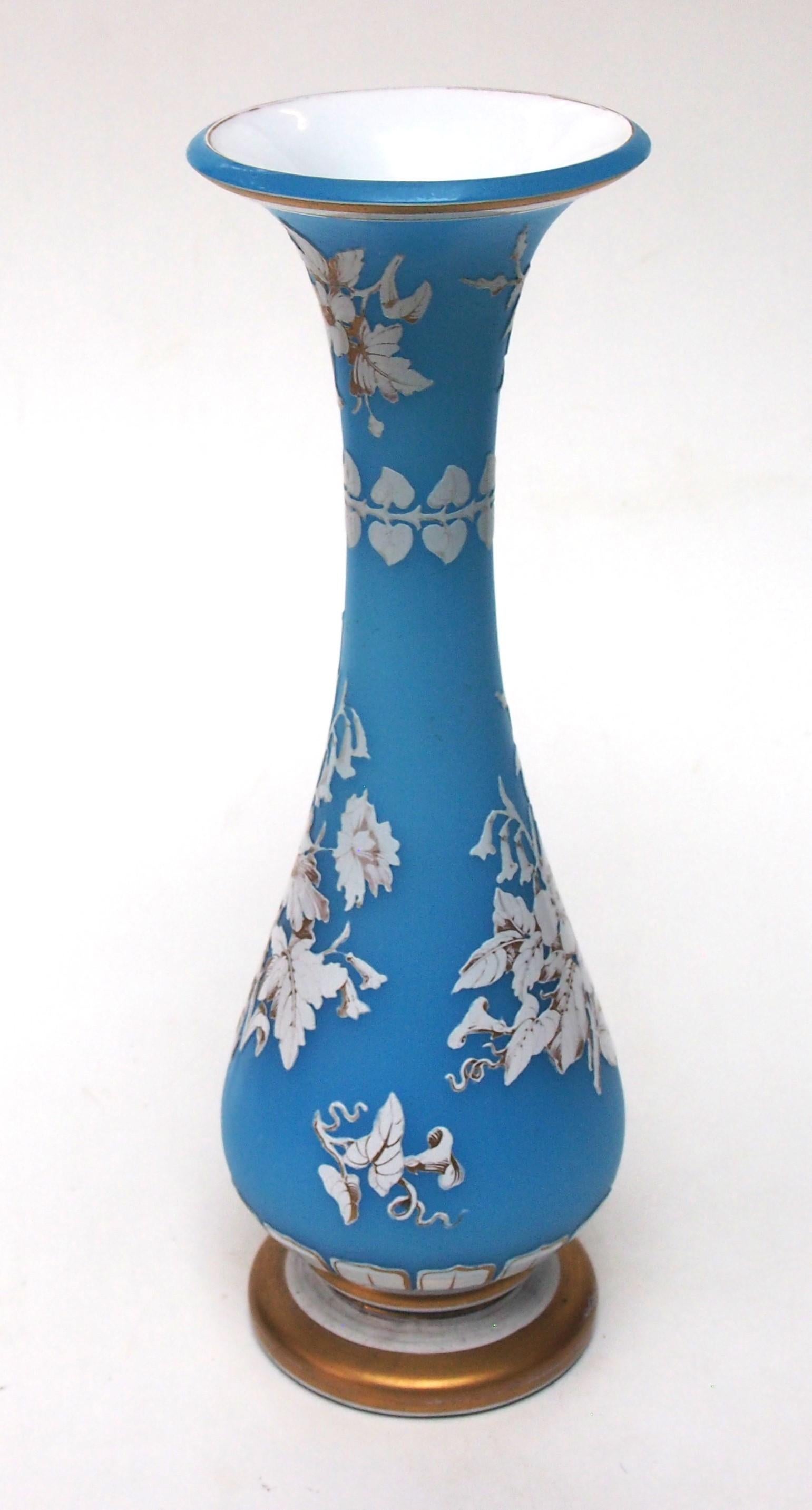A rare early Victorian Harrach cameo vase in blue, cased on both sides with opaque white, and cut to blue on the outside to reveal a stylised decoration and a floral/botanical scene -highlighted in gilding. Generally Cameos were considered to have