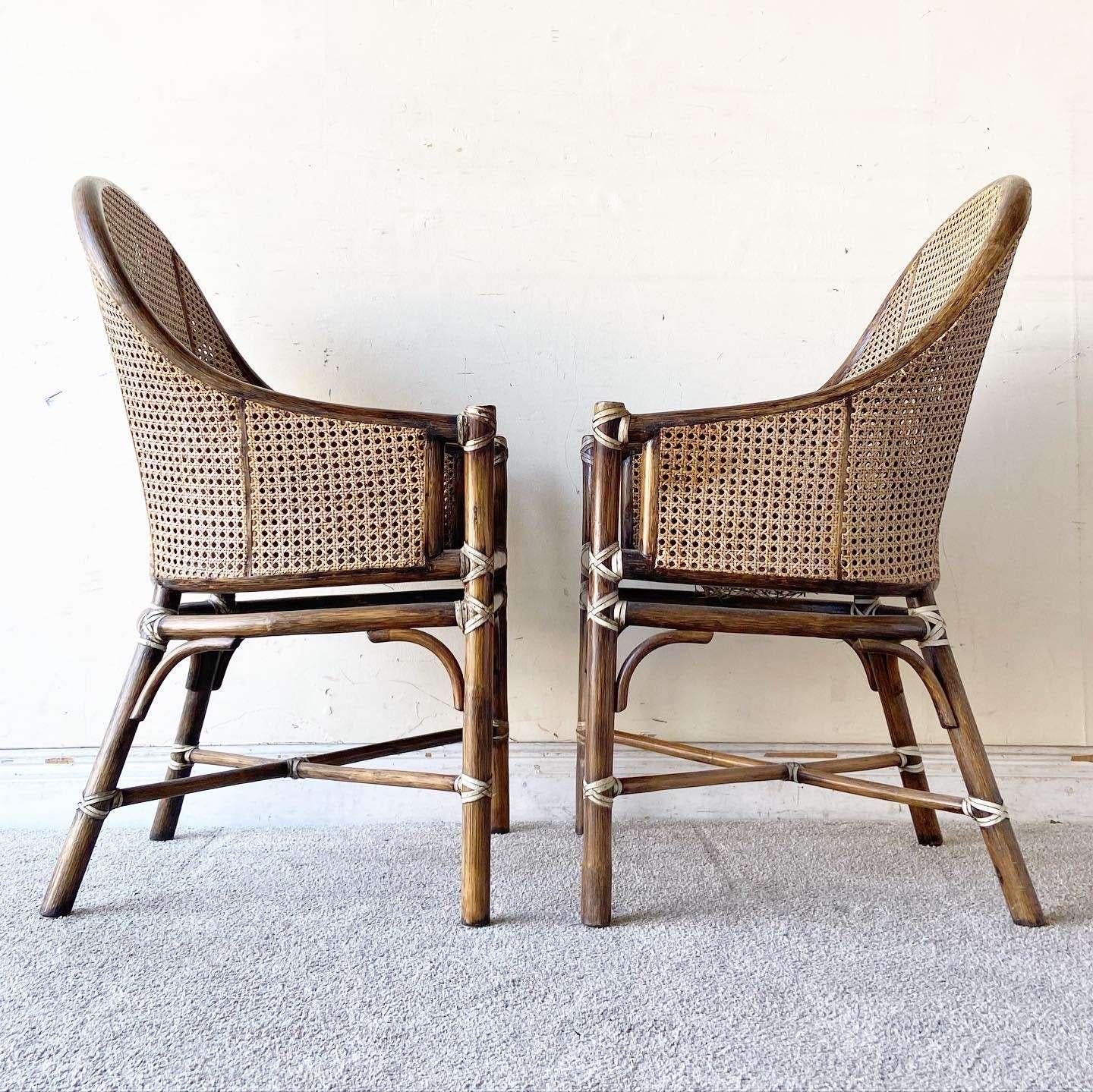 American Bohemian Bamboo and Cane Arm Chairs by McGuire - Set of 4 For Sale
