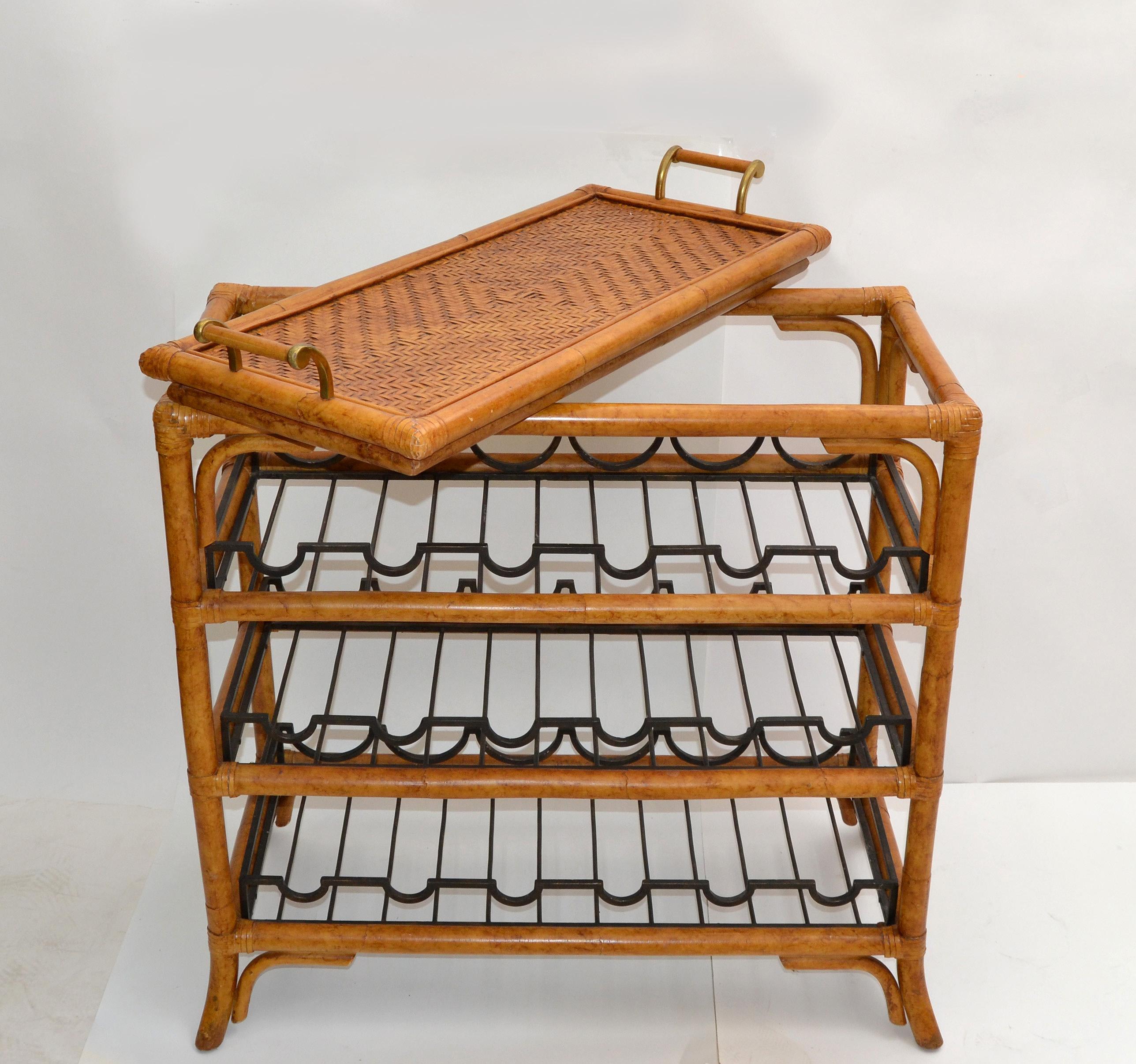 Mid-Century Modern Boho Chic rectangular bamboo stand with wrought iron bottle rack and comes with a serving tray. Tray measures: Height: 4 inches, Depth: 13.25 inches, Length: 31.5 inches.
The handles have brass detail.
The wine stand can hold up