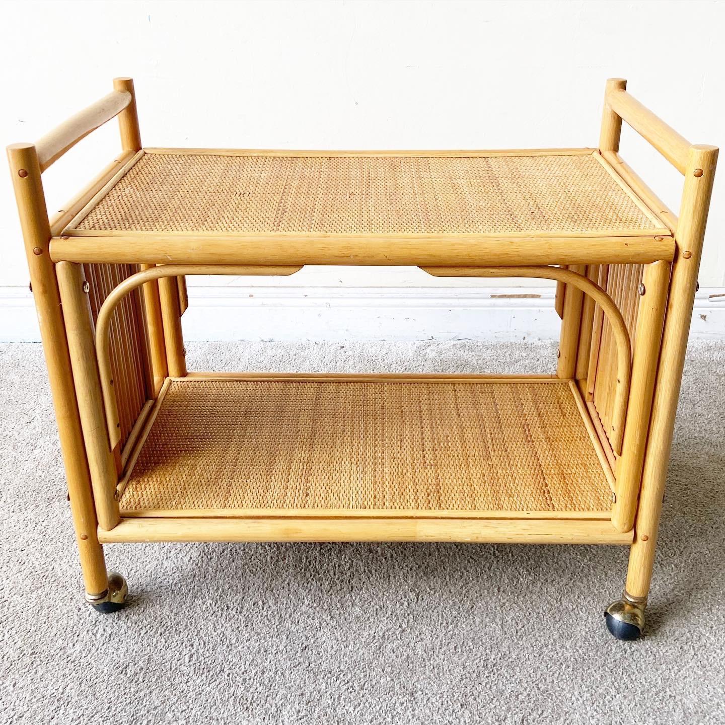 Exceptional boho chic bar cart. Features a bamboo and woven frame.

