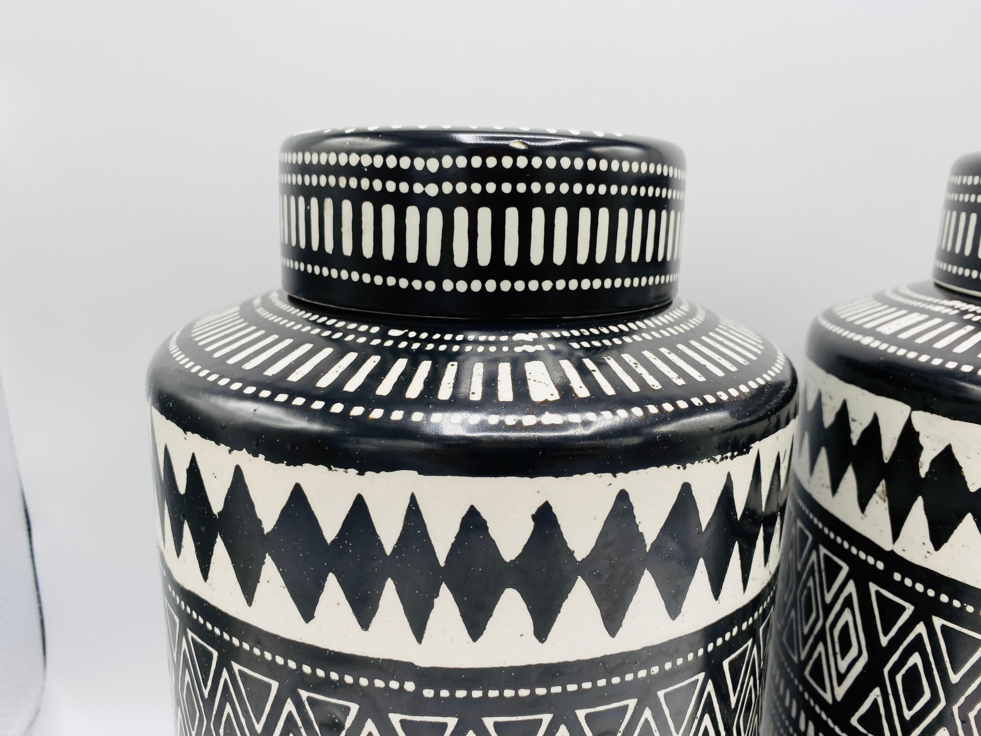black and white ceramic canisters