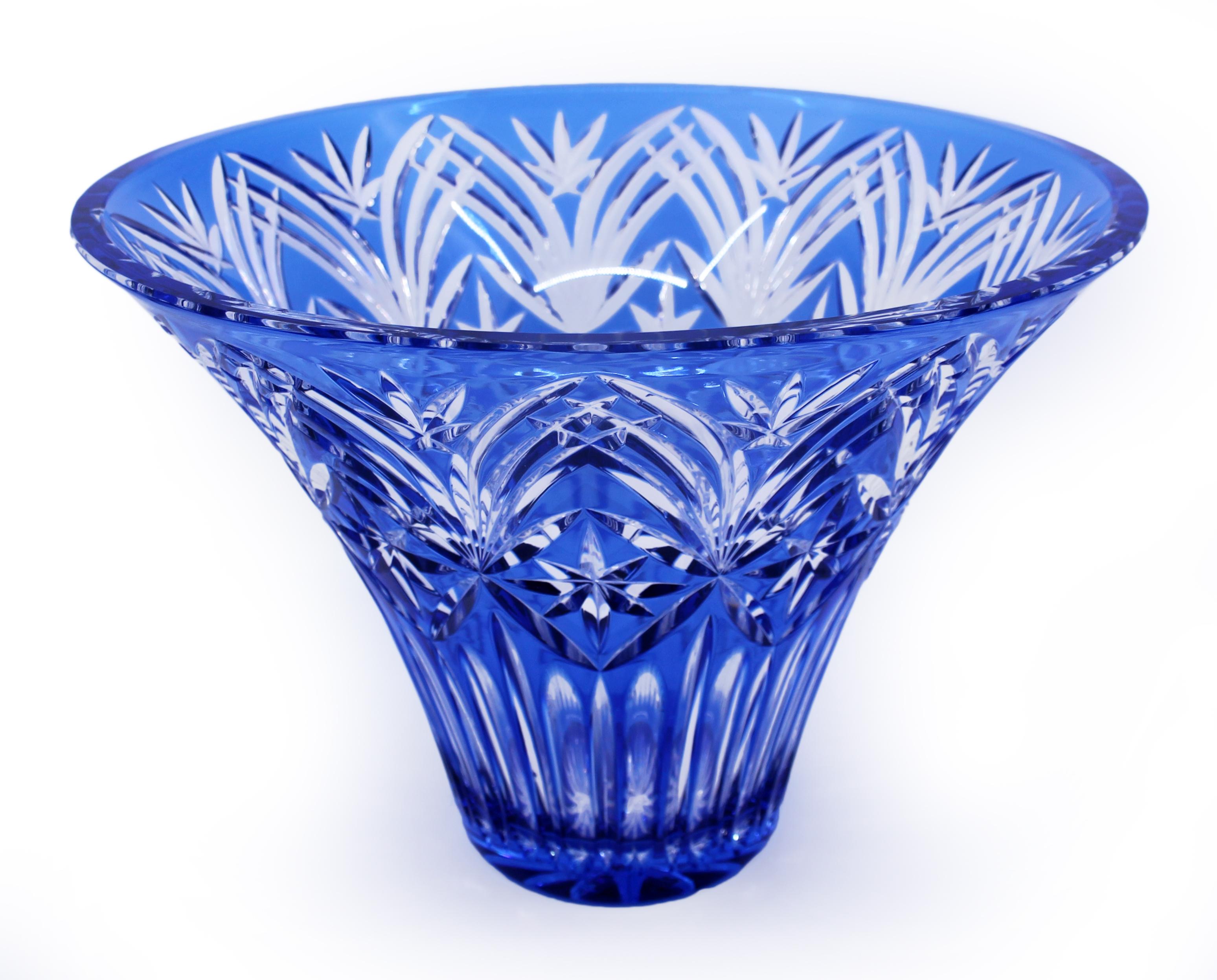 Bohemian Blue Overlay Cut Crystal Centrepiece Vase, Mid-20th Century
A striking Bohemian crystal centrepiece vase, expertly hand-crafted in rich cobalt blue overlay on clear glass. The flared, trumpet form is extensively decorated with deep