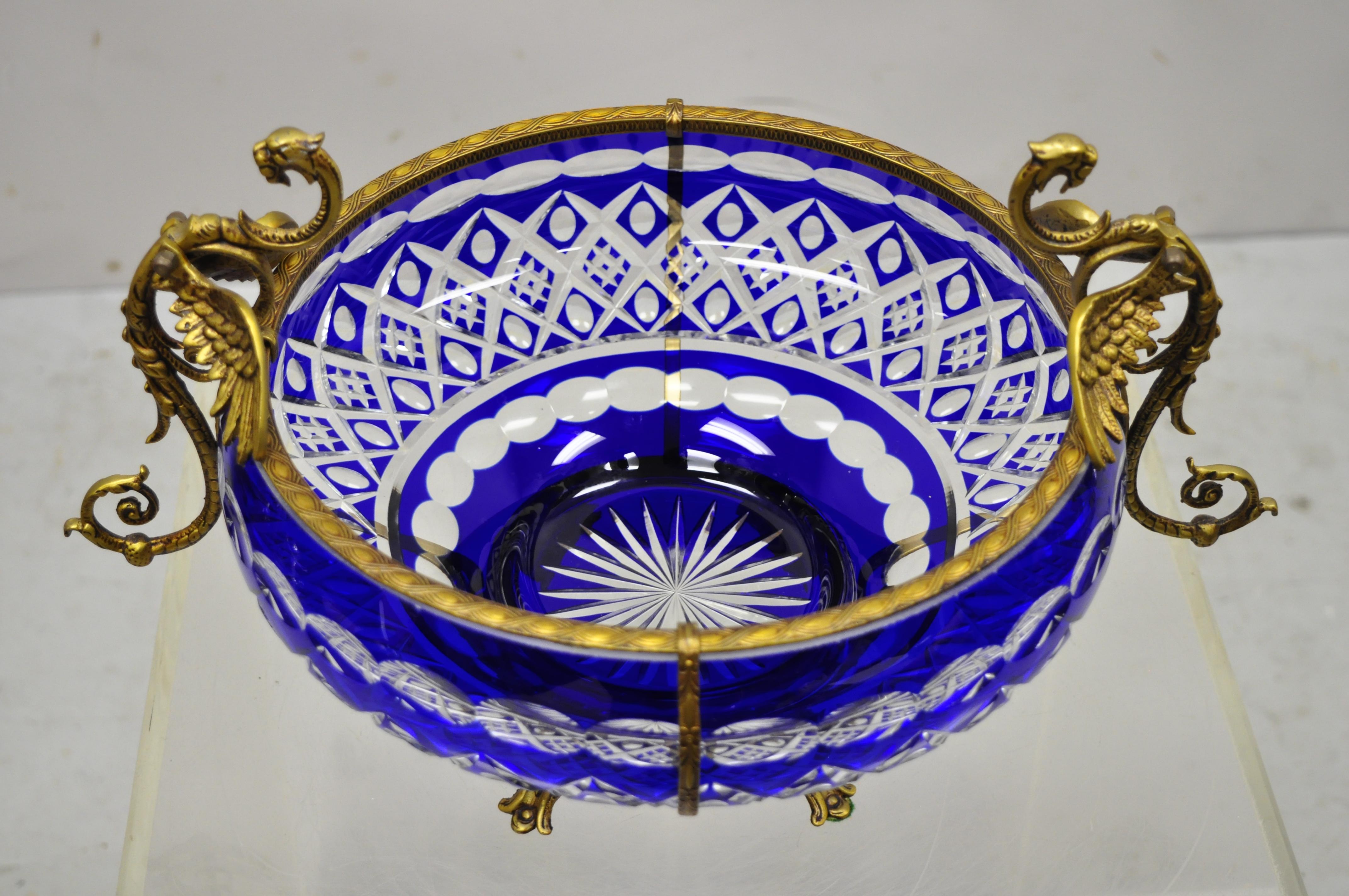 Bohemian bronze mounted cobalt blue cut to clear centerpiece platter bowl with dragons. Circa Mid to Late 20th Century. Measurements: 10