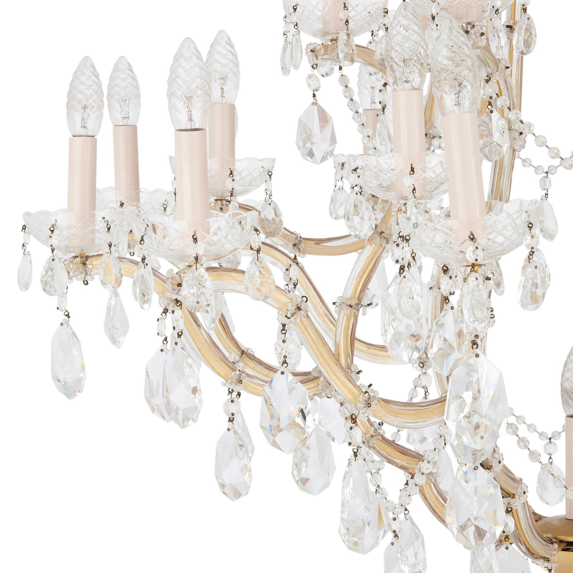 Bohemian chandelier with cut-glass pendants
Bohemian, 20th century
Measures: Height 130 cm, diameter 105 cm

This luxurious chandelier is crafted in the Bohemian manner from wonderfully faceted cut glass. The chandelier features twenty-five