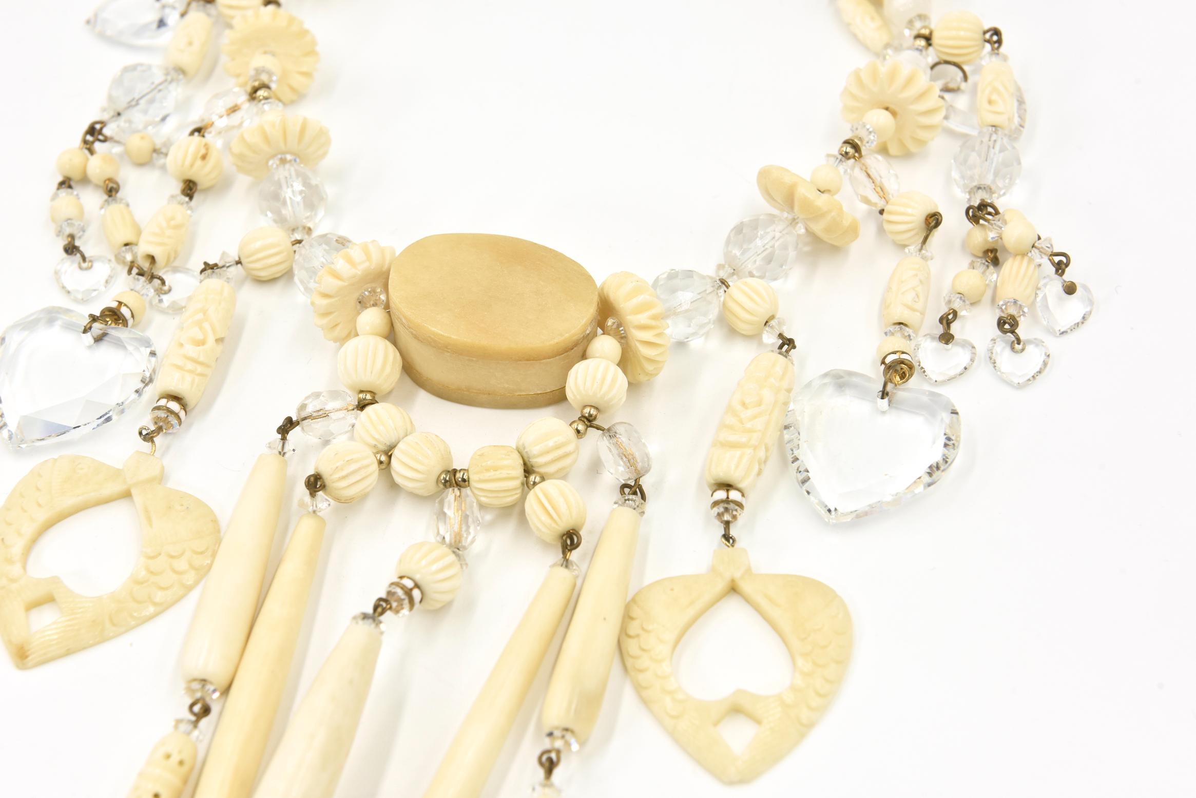Bohemian Chic Carved Bone and Lucite Hearts Bib Necklace with Dangling Earrings  For Sale 1