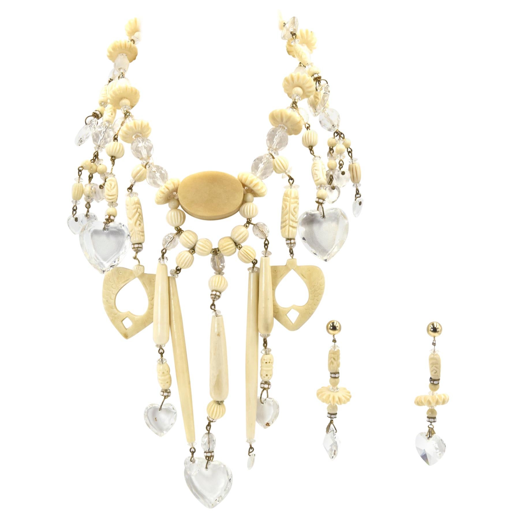 Bohemian Chic Carved Bone and Lucite Hearts Bib Necklace with Dangling Earrings  For Sale