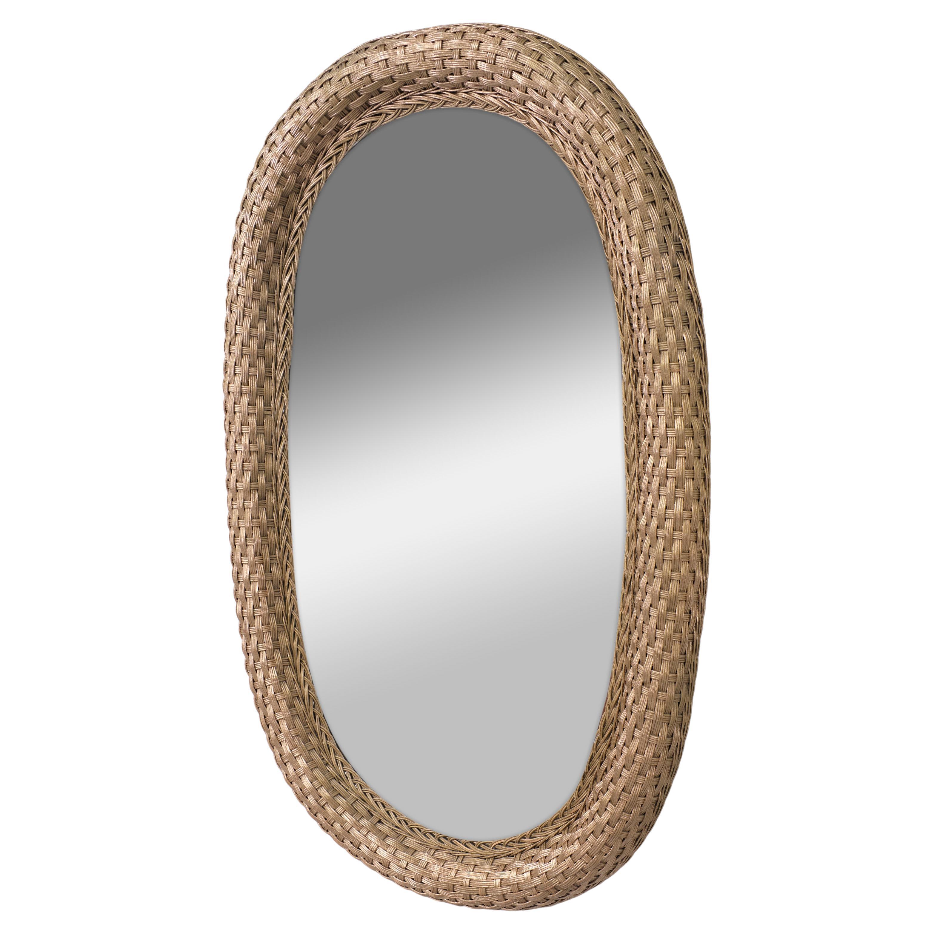 Very nice Bohemian Chic Wall Mirror . Gold Color Wicker .Oval shaped .
Handcrafted . 1960s Holland 

Please don't hesitate to reach out for alternative shipping quotes