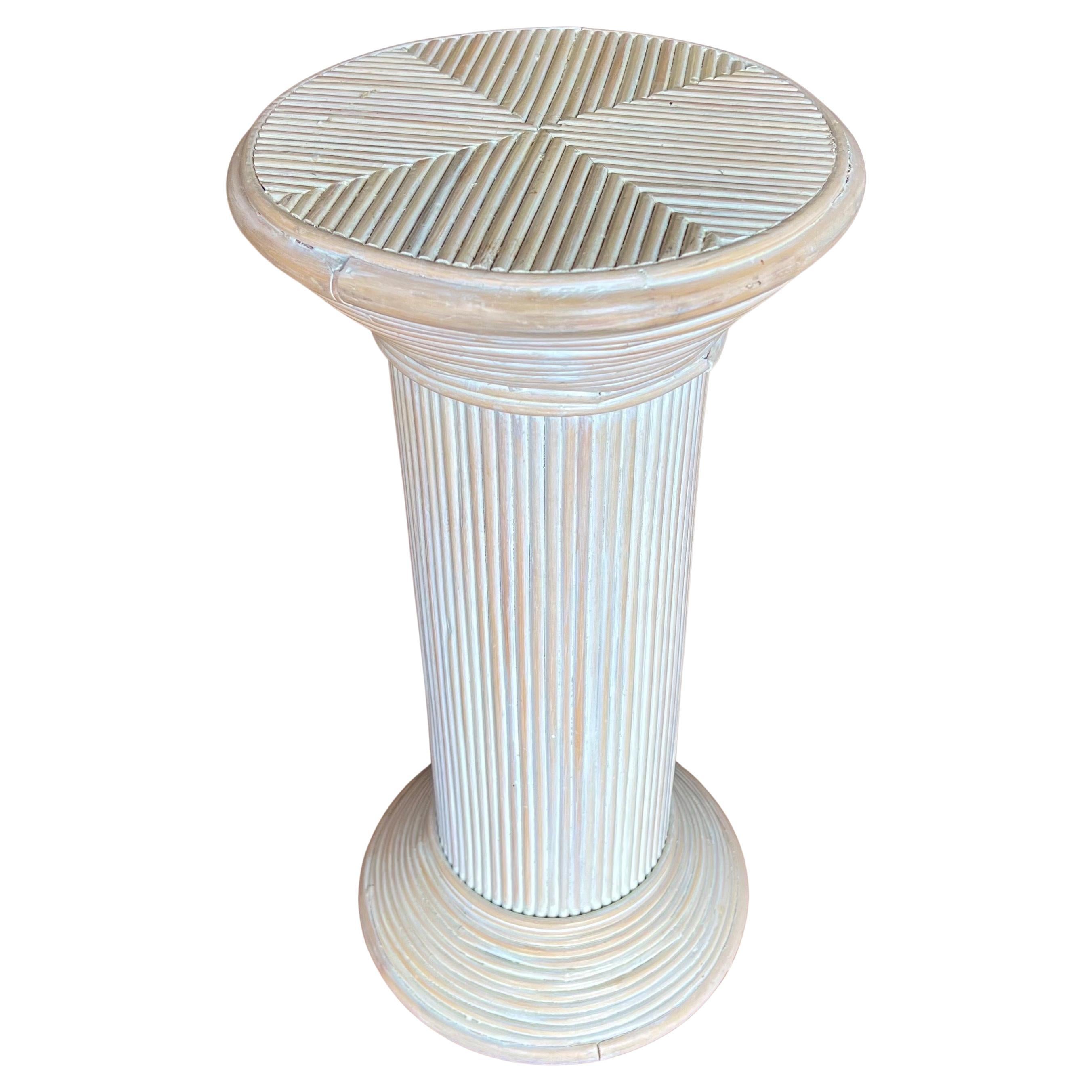 Elegant Bohemian Coastal decor Pencil Reed rattan Display Pedestal Column circa 1980's in a white wash finish beautiful simple great condition by itself or with a sculpture  great accent decor.