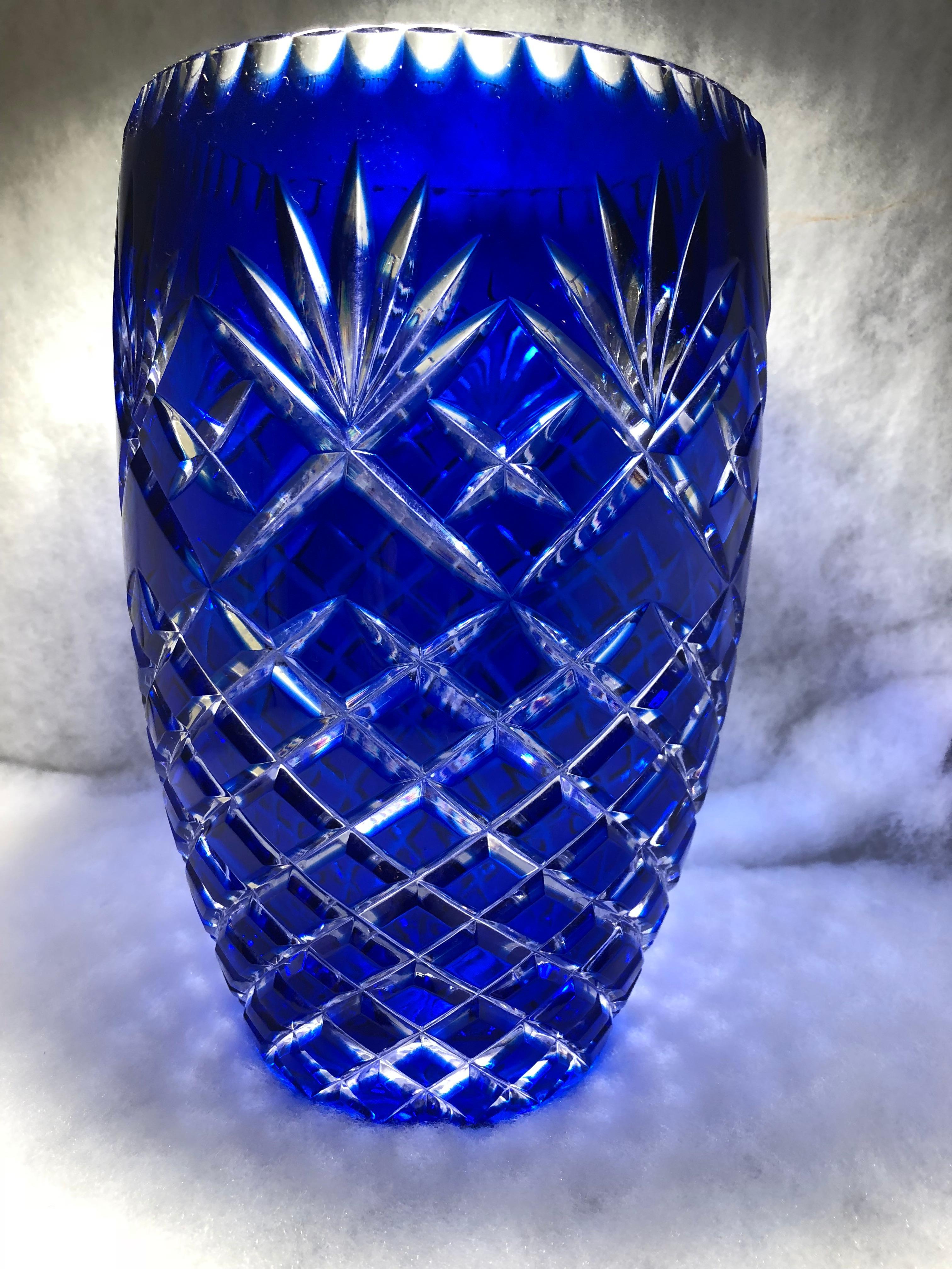 Beautiful heavy glass vase is cobalt cut to clear. Perfect condition.