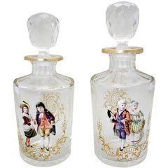 Bohemian Crystal Dresser Bottles, Pair with Hand-Painted Enamel Figures and Gold