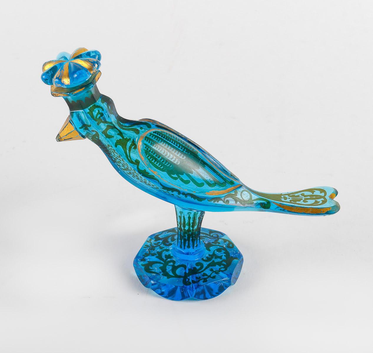 Bohemian Crystal Enamelled Bird Bottle, 19th Century.

Bohemian crystal bird bottle enamelled with silver and gold, 19th century, Napoleon III period.    
h: 12.5cm, w: 15cm, d: 5cm